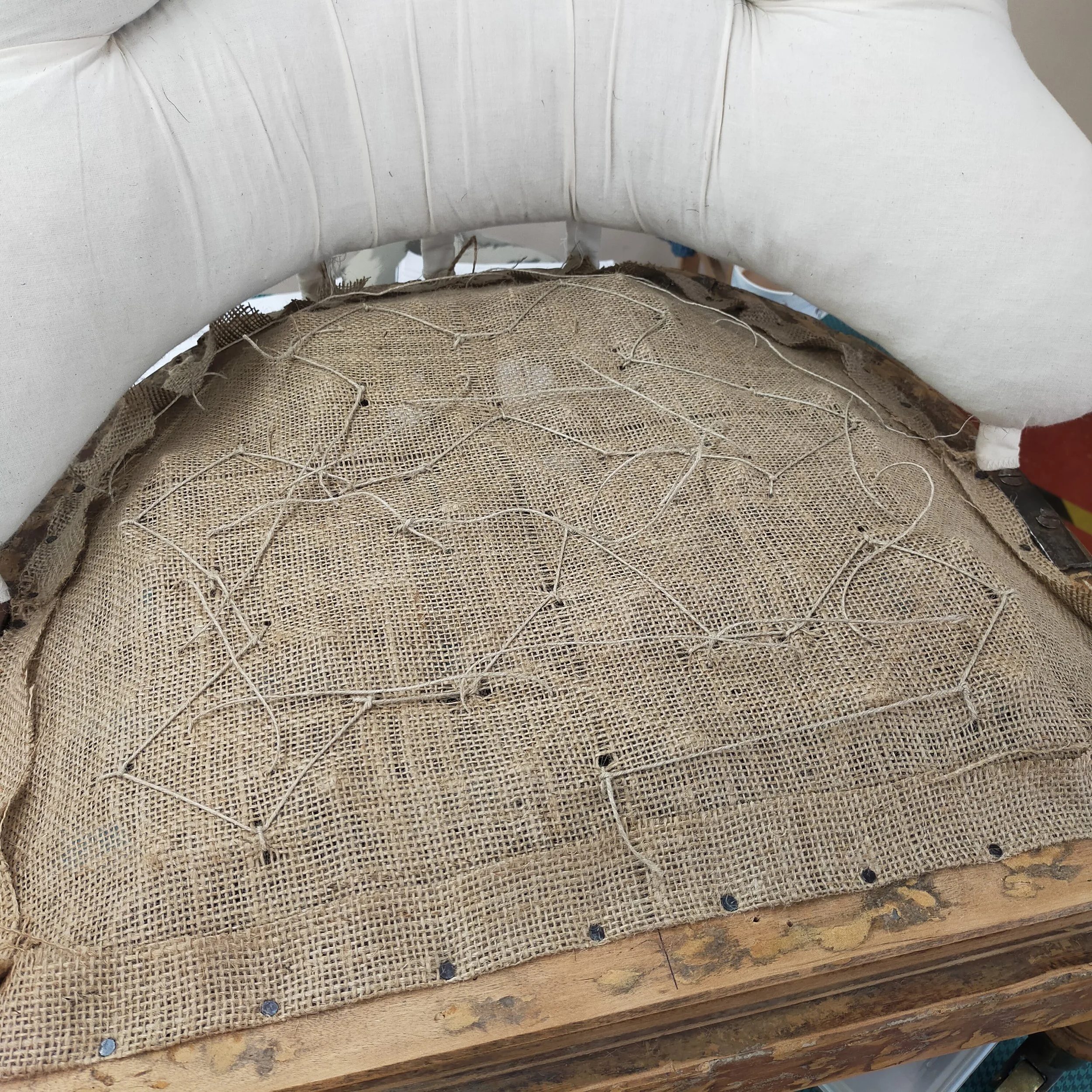 Seat lined and bridal ties sewn to hold stuffing in place