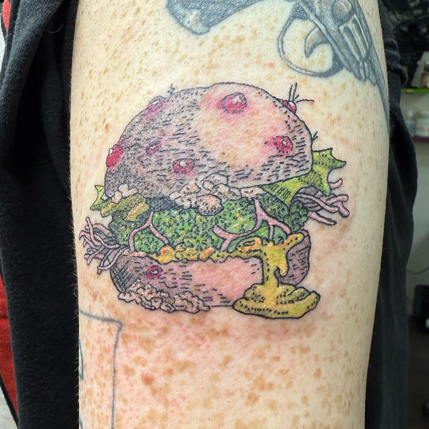 burgertattoodonebyFIG_thetattooer _TidalWavveTattoo.png