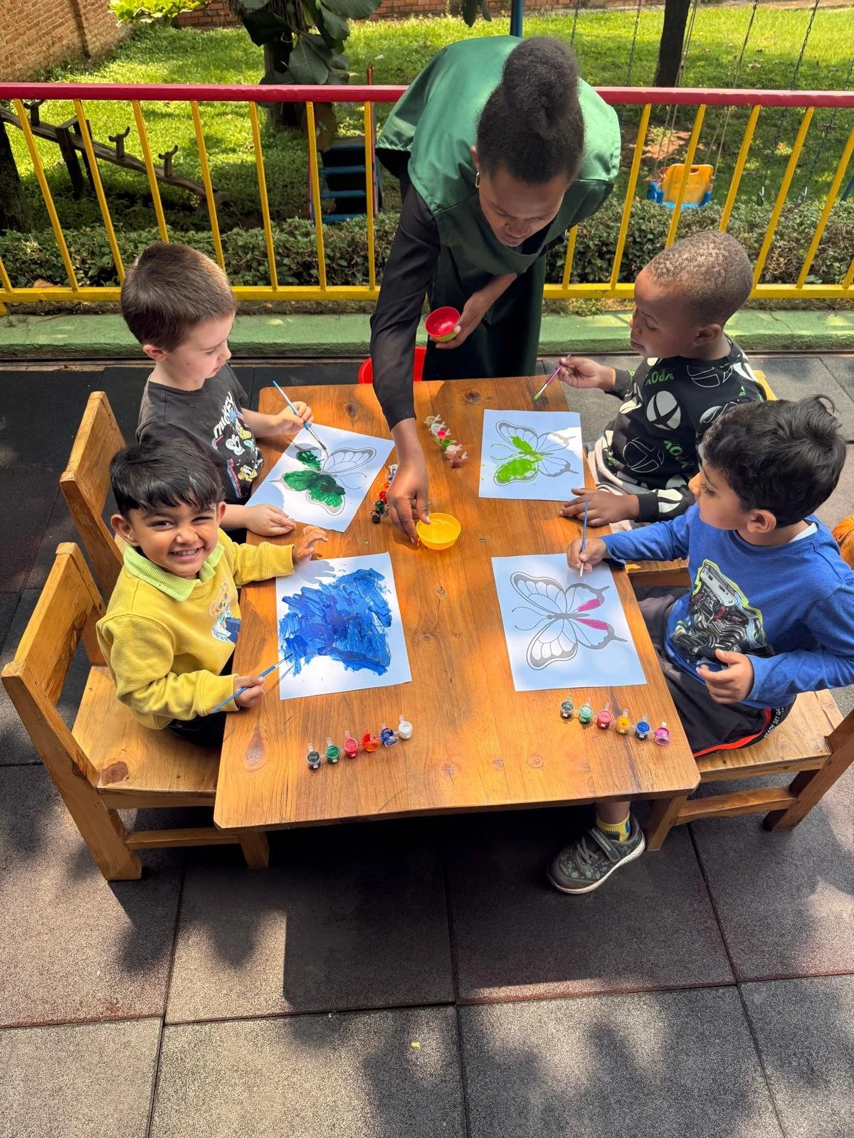 kids at table painting2 .jpeg