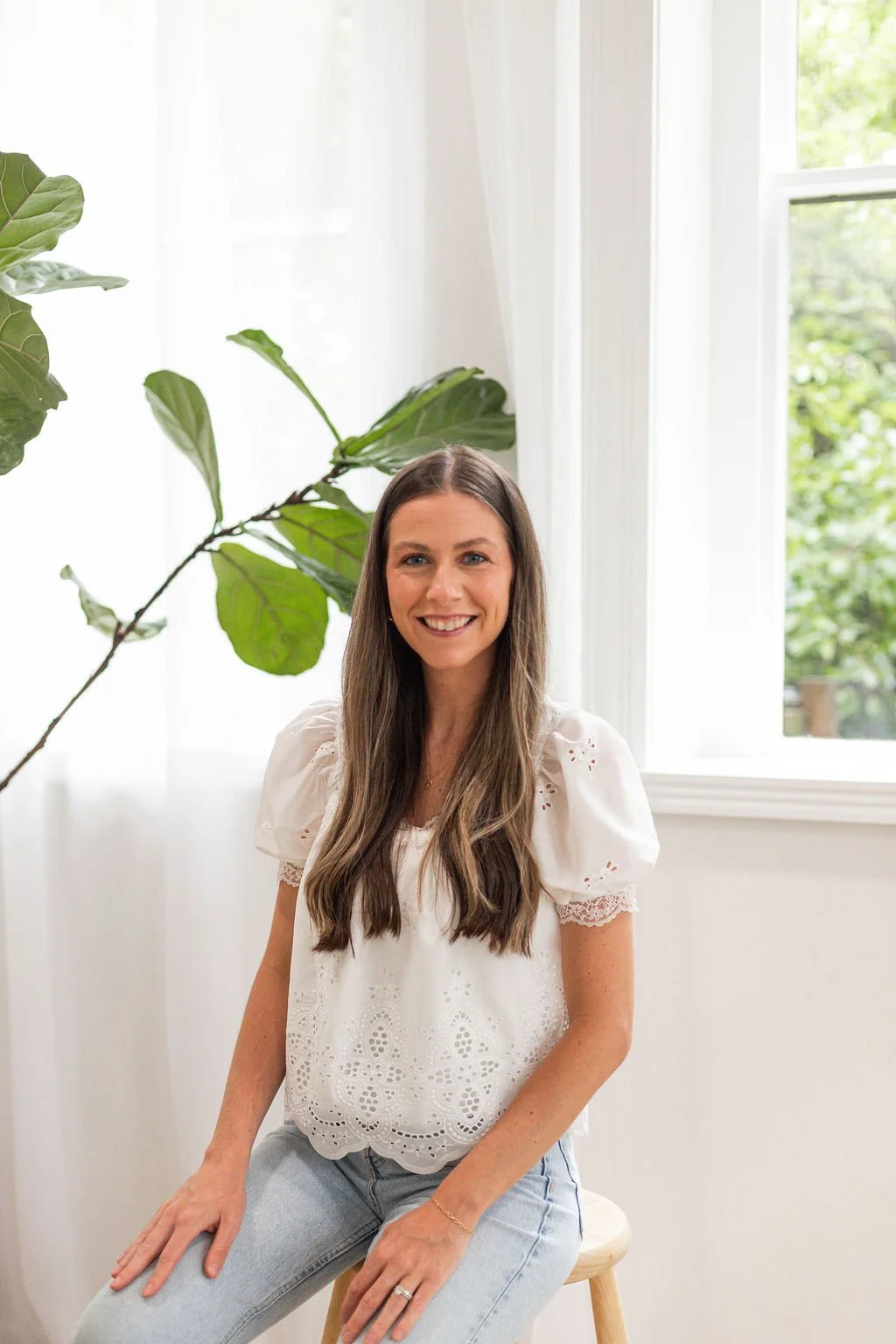 Andi, Columbus Ohio Thrive Doula Marketing Coordinator, smiling in professional headshot