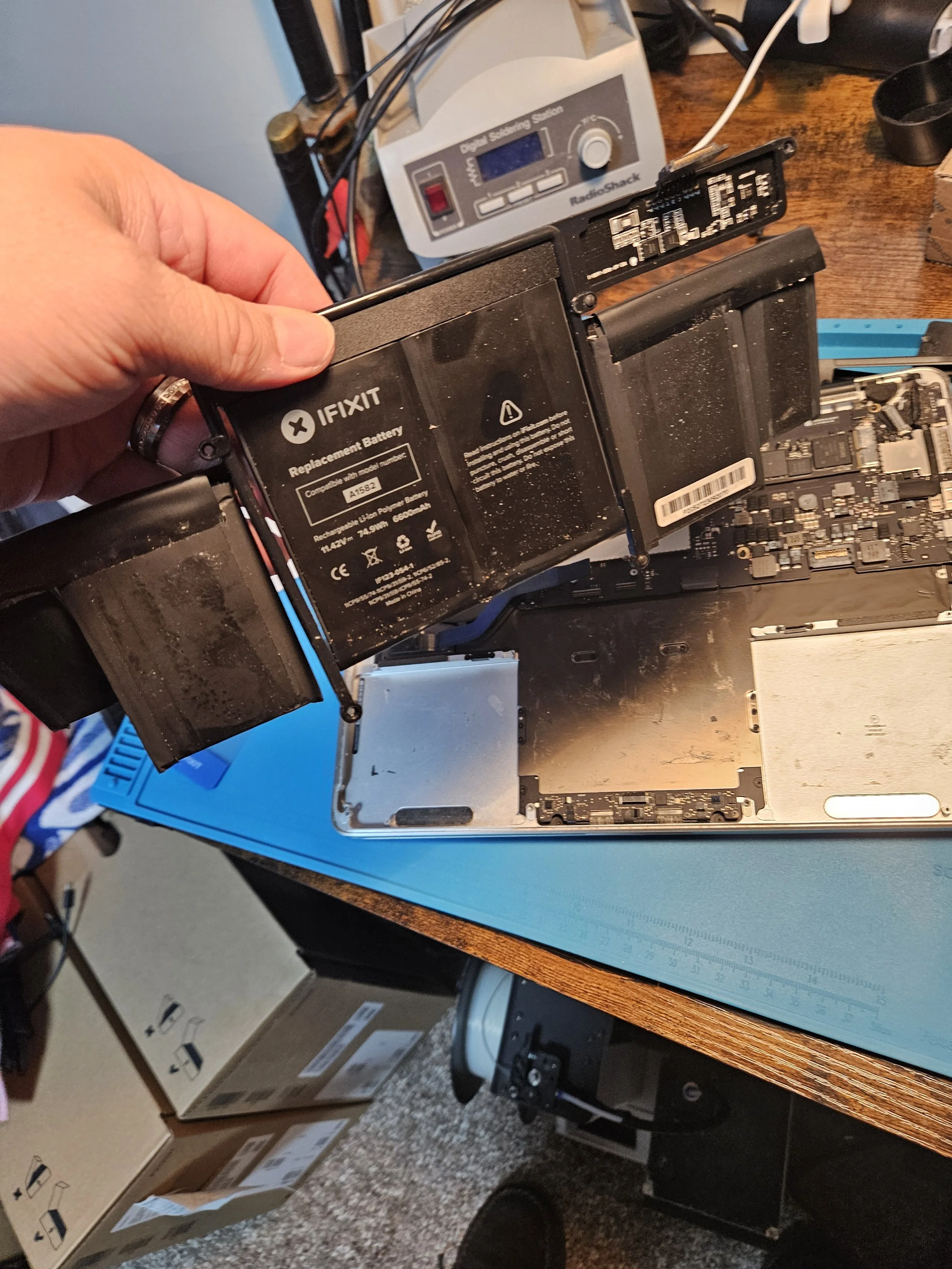 Old battery fully out of the MacBook Pro