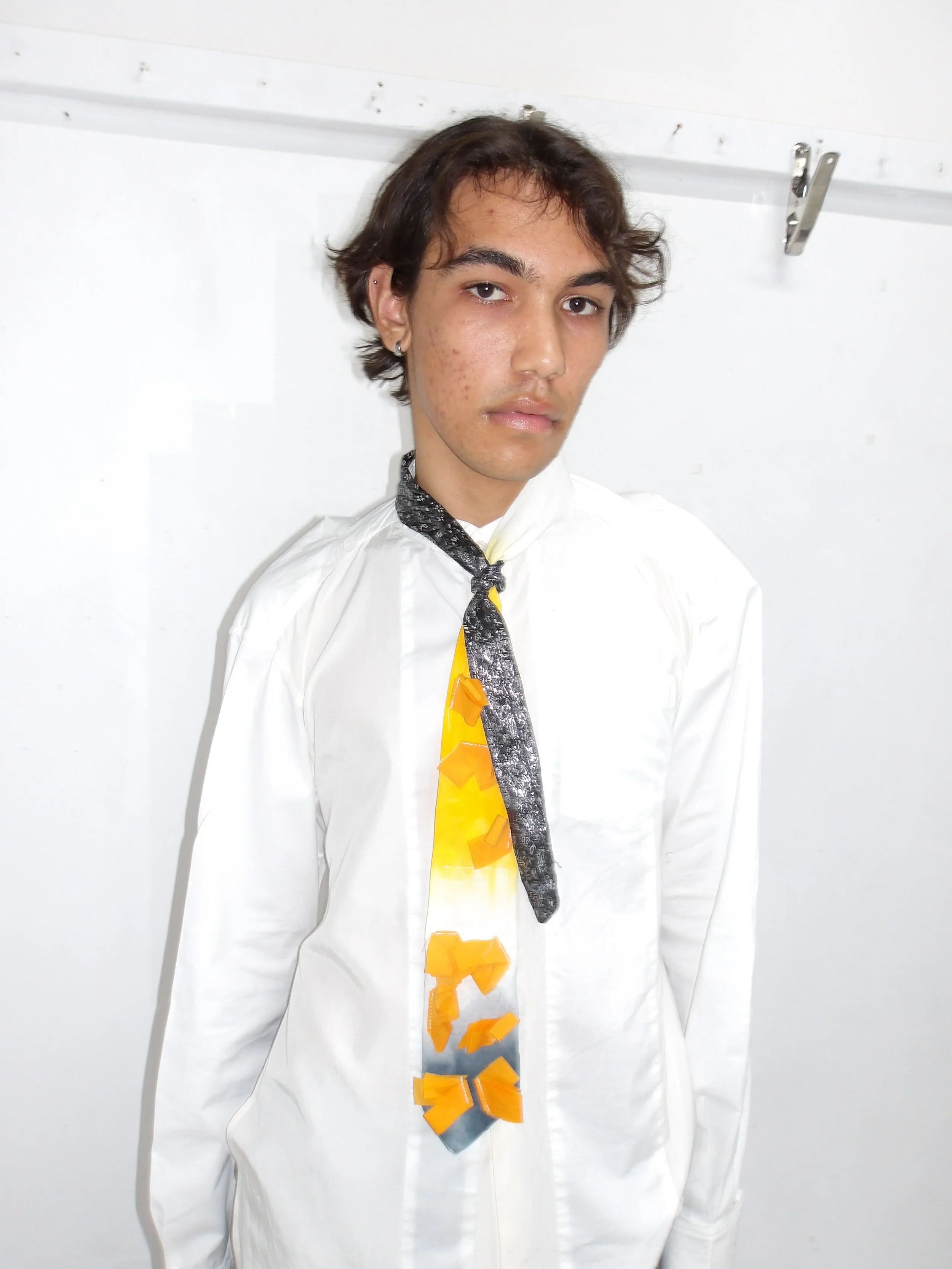 Panelled tie-dyed tie with appliqué