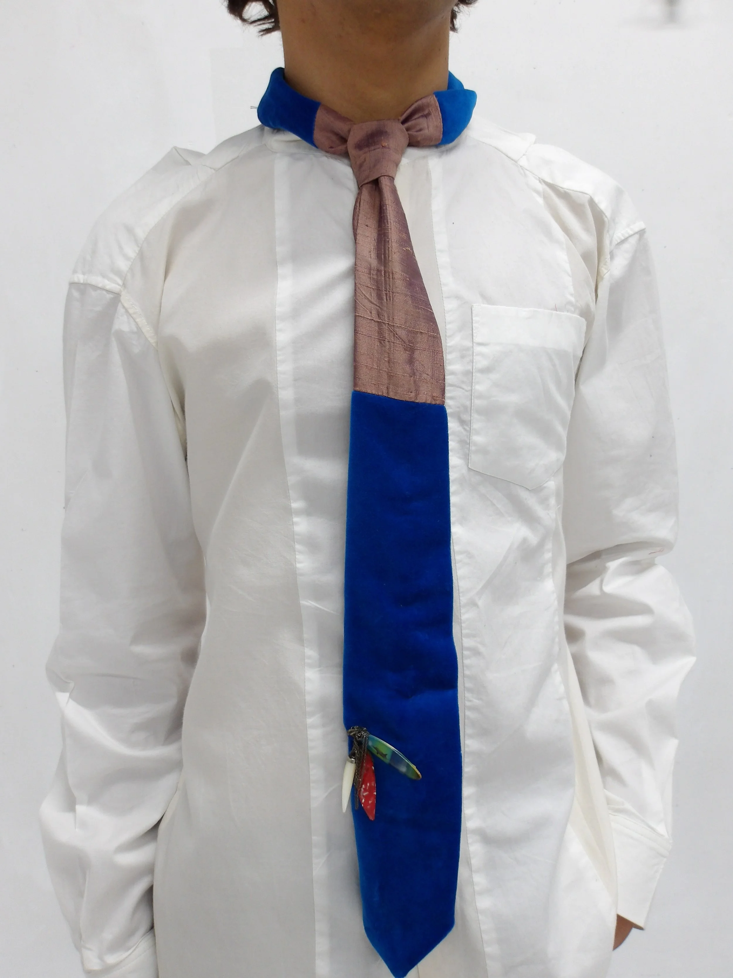 Blue velvet tie with hand stitched adornments