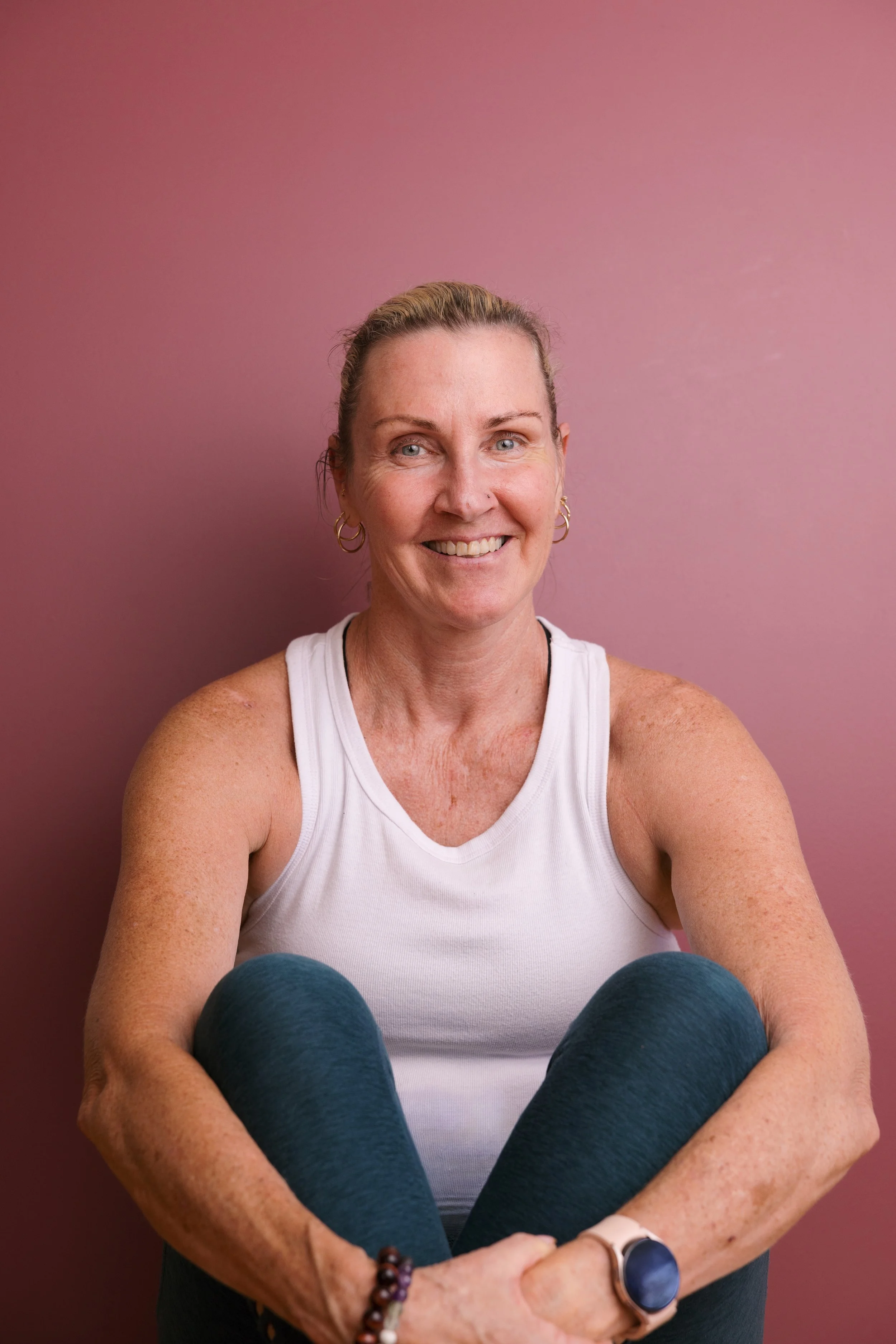 A woman smiling. Yoga teacher in the Blue Mountains.