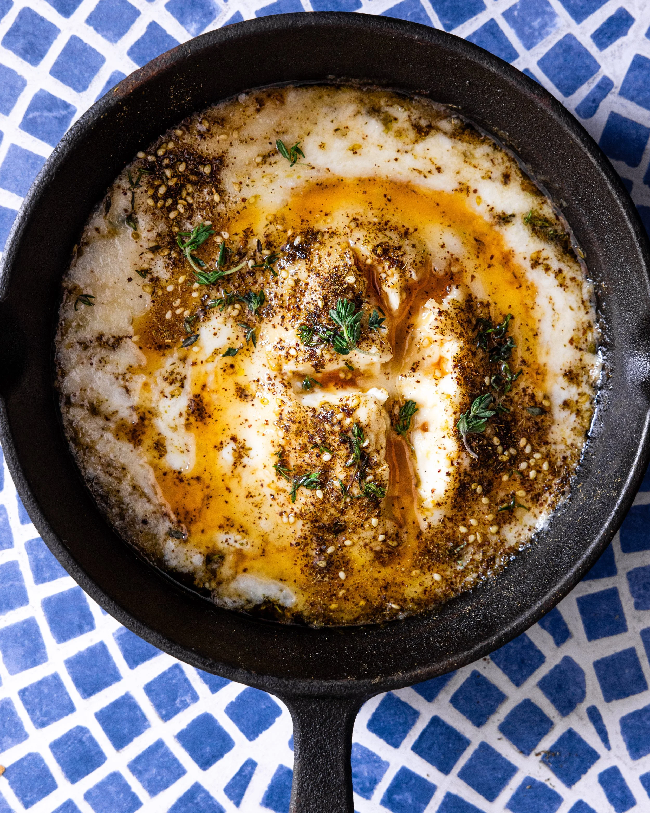 baked feta cheese with zaatar, honey & thyme.