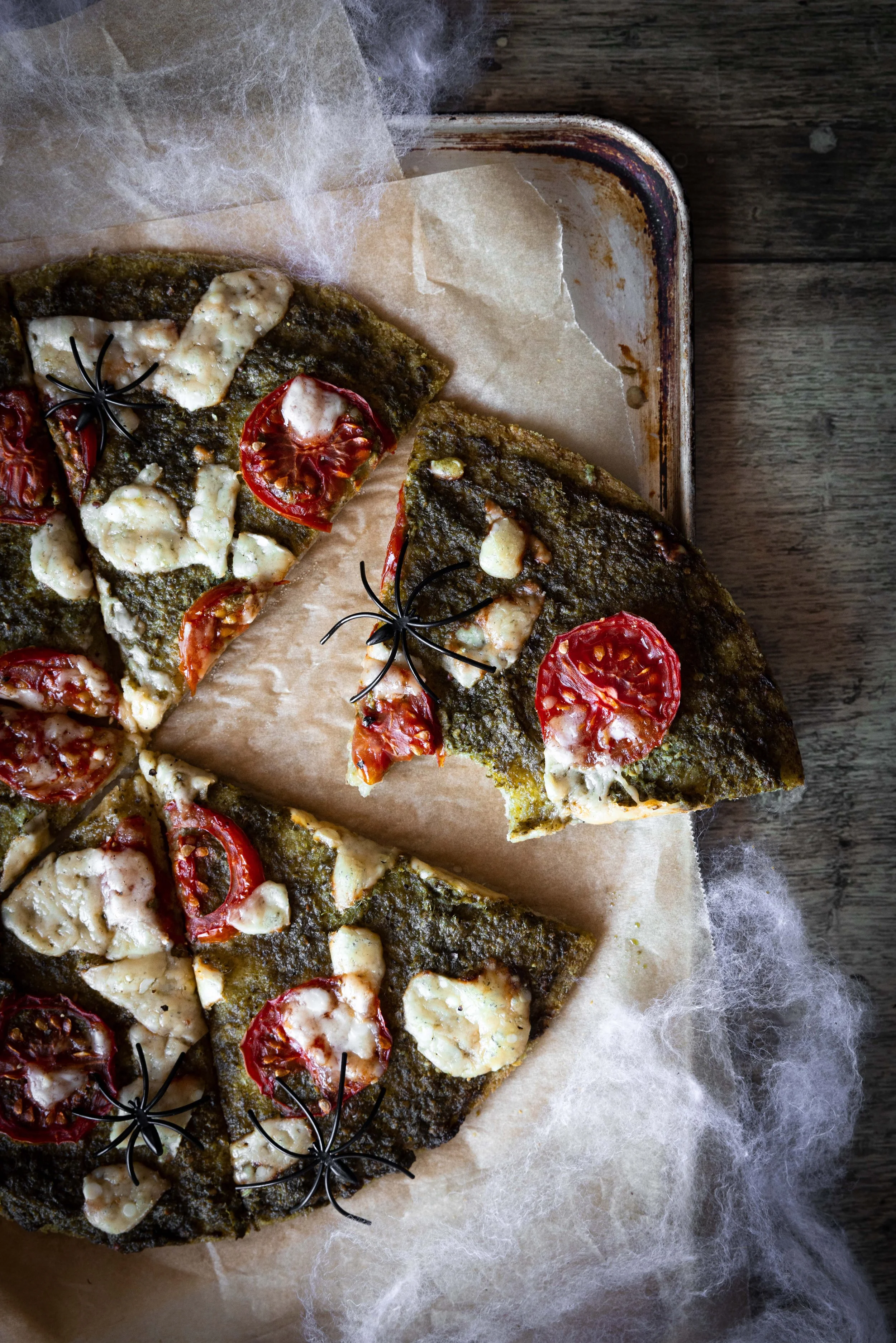 spooky halloween pesto pizza.