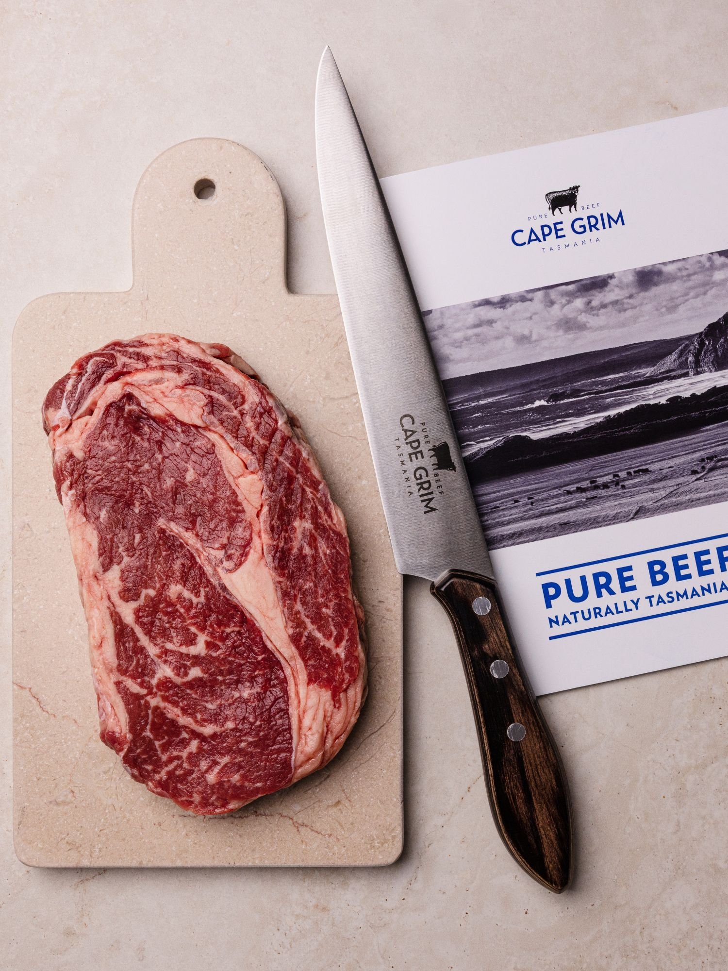 Cape Grim raw scotch fillet steak with knife