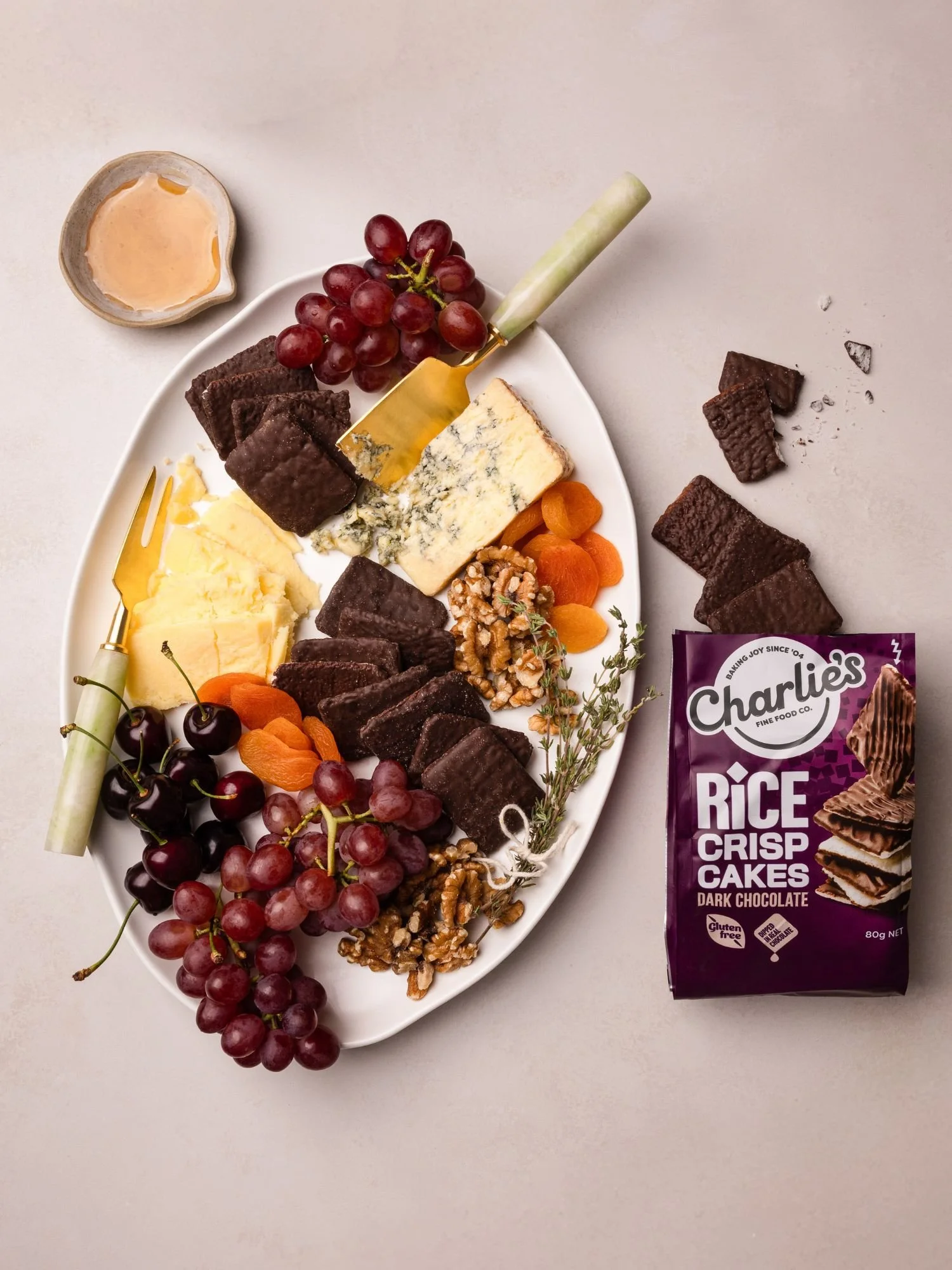 Chocolate and cheese platter with Charlie’s Fine Foods rice crisp cakes