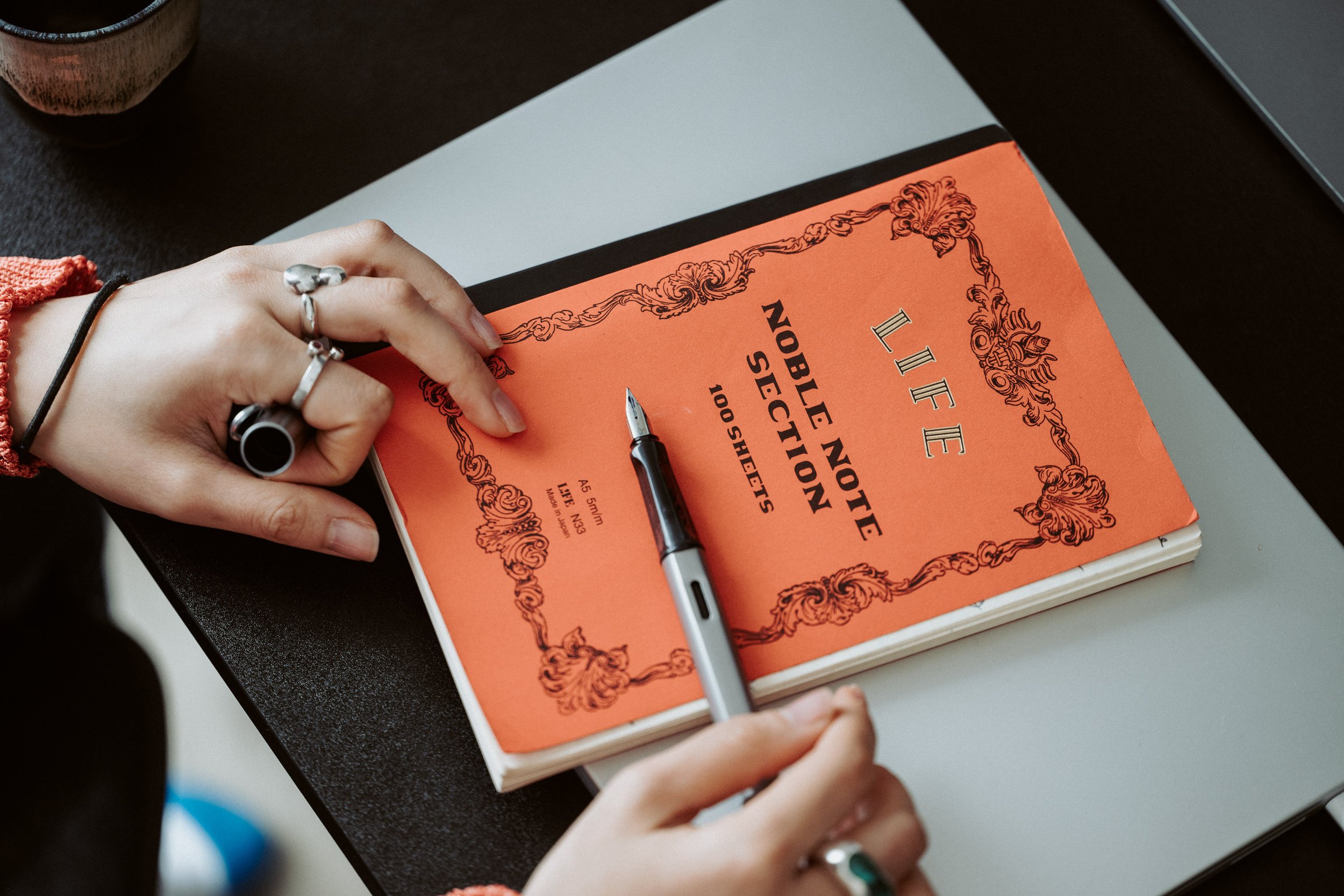 Her orange notebook