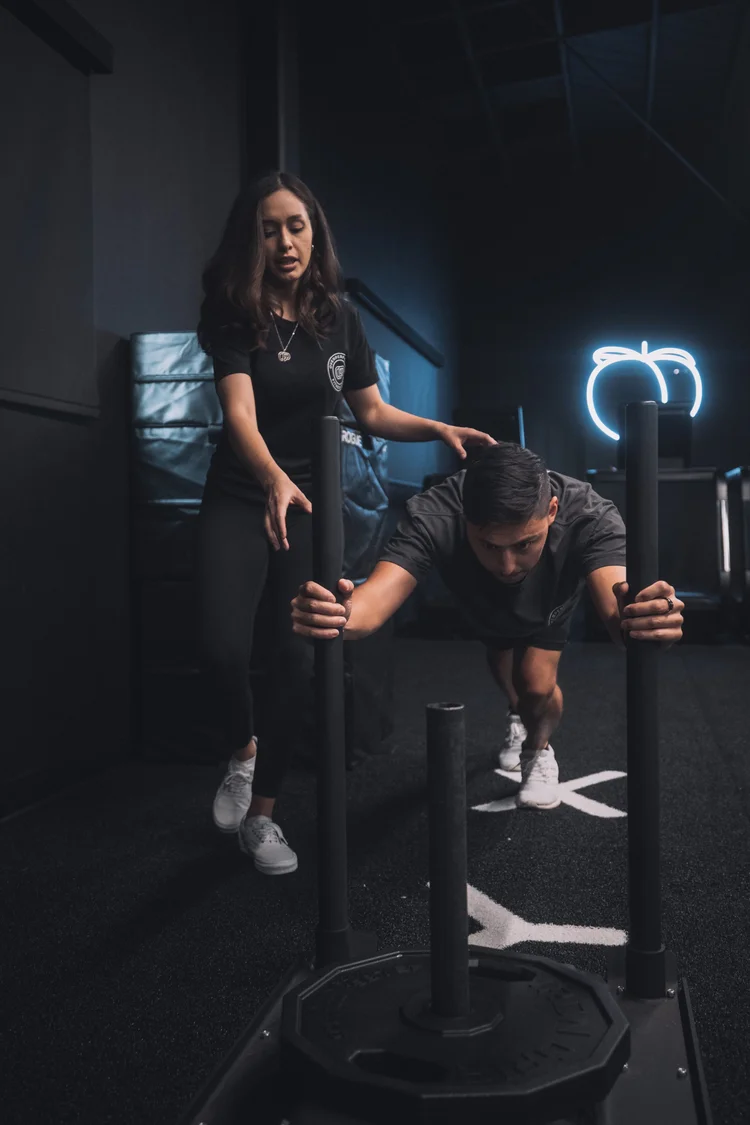 Crown Fitness personal trainer working with a client in Irvine, CA