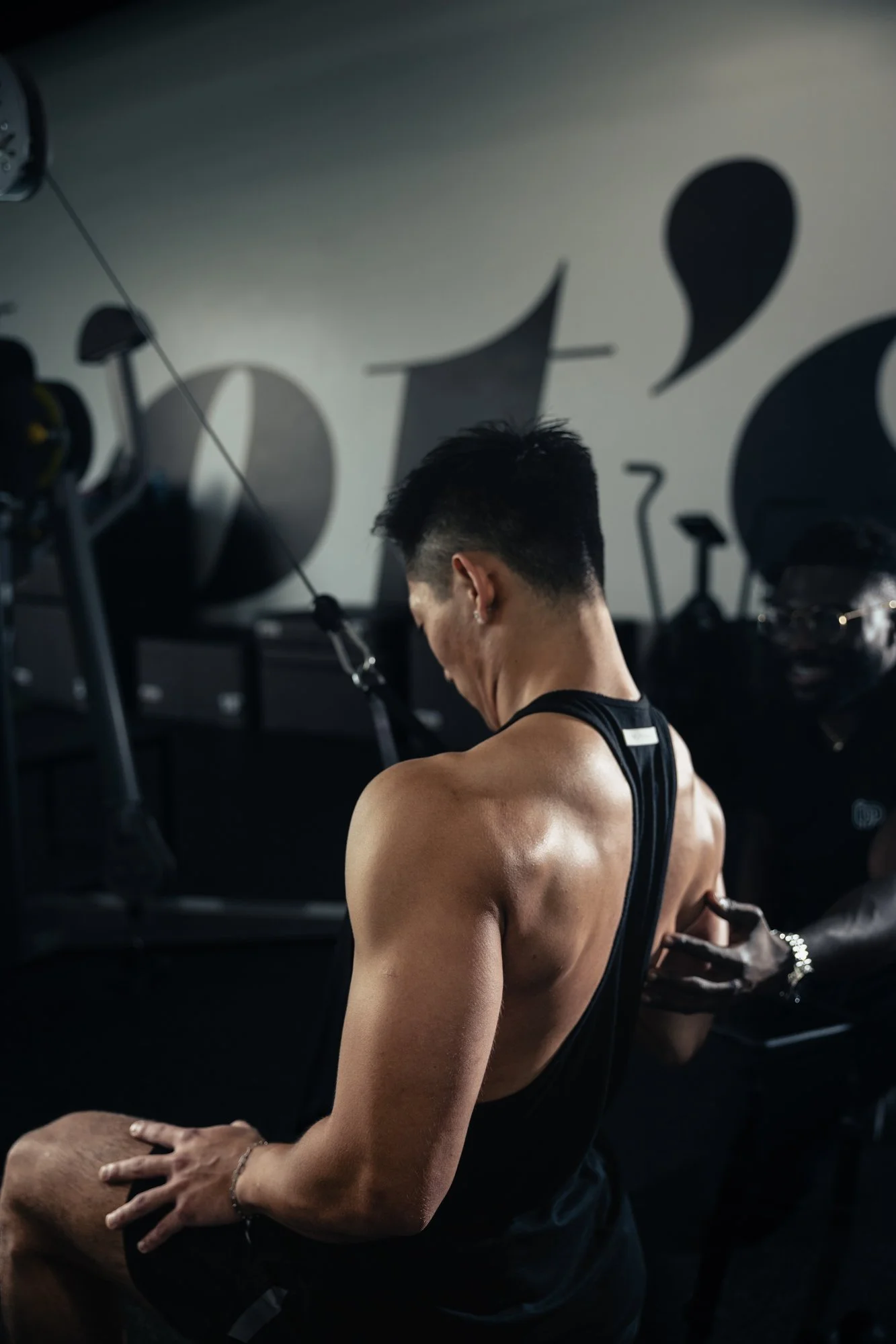 Private coach cueing a seated cable row to improve posture and build back muscle—evidence-based personal training for professionals in Newport Beach, Irvine, and across Orange County.