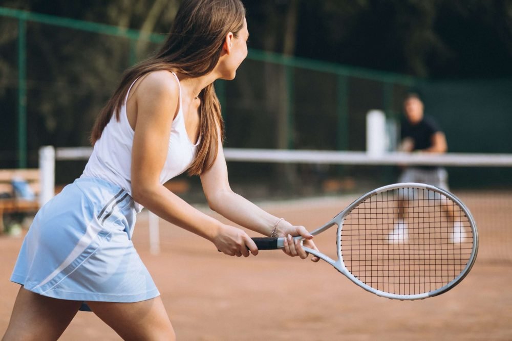 Tennis-lessons-in-Abu-Dhabi-scaled-e1643015954877.jpg