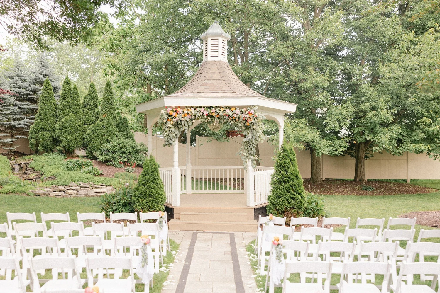 A ceremony at the gazebo at Holland Gardens