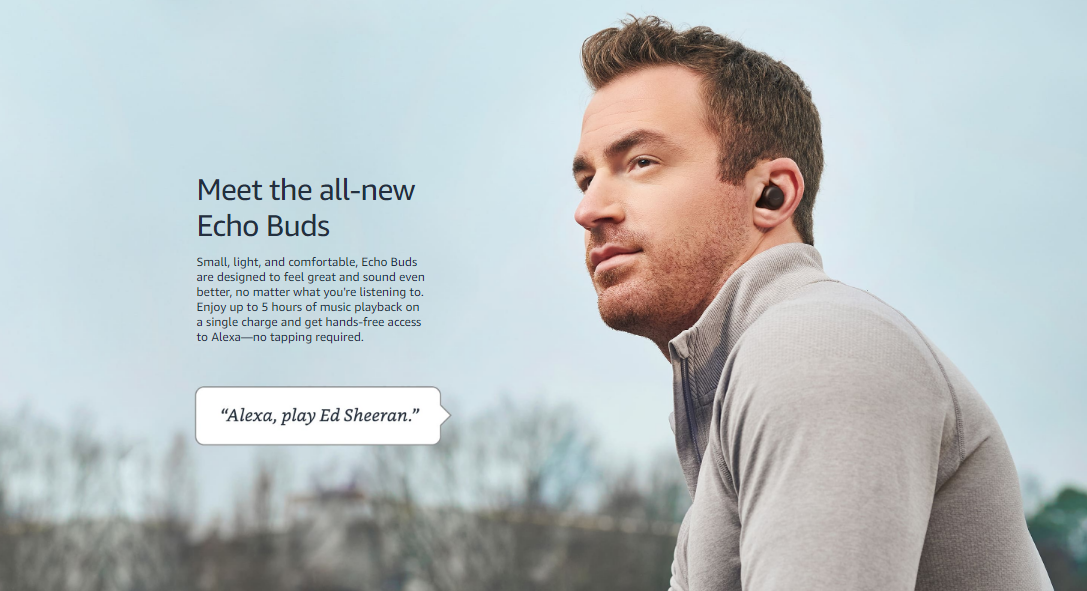 A man wearing gray activewear and black Echo Buds with a wireless charging case, outdoors against a blue sky, promoting Echo Buds with text about their features.