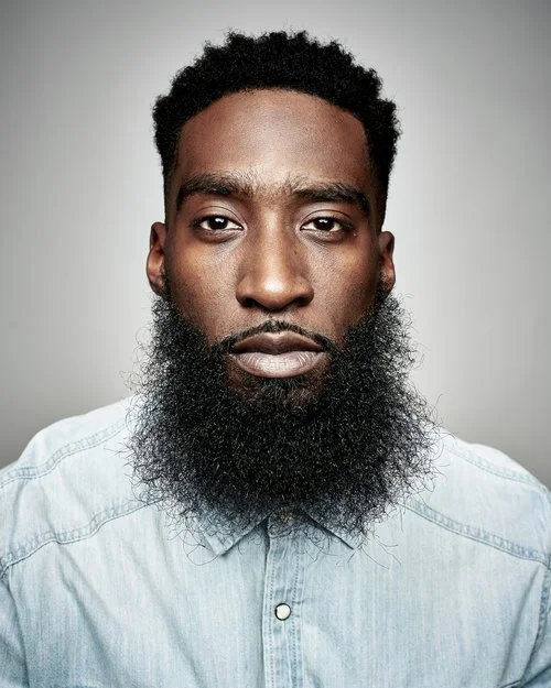 Portrait photographer creating campaign imagery focused on identity and human connection