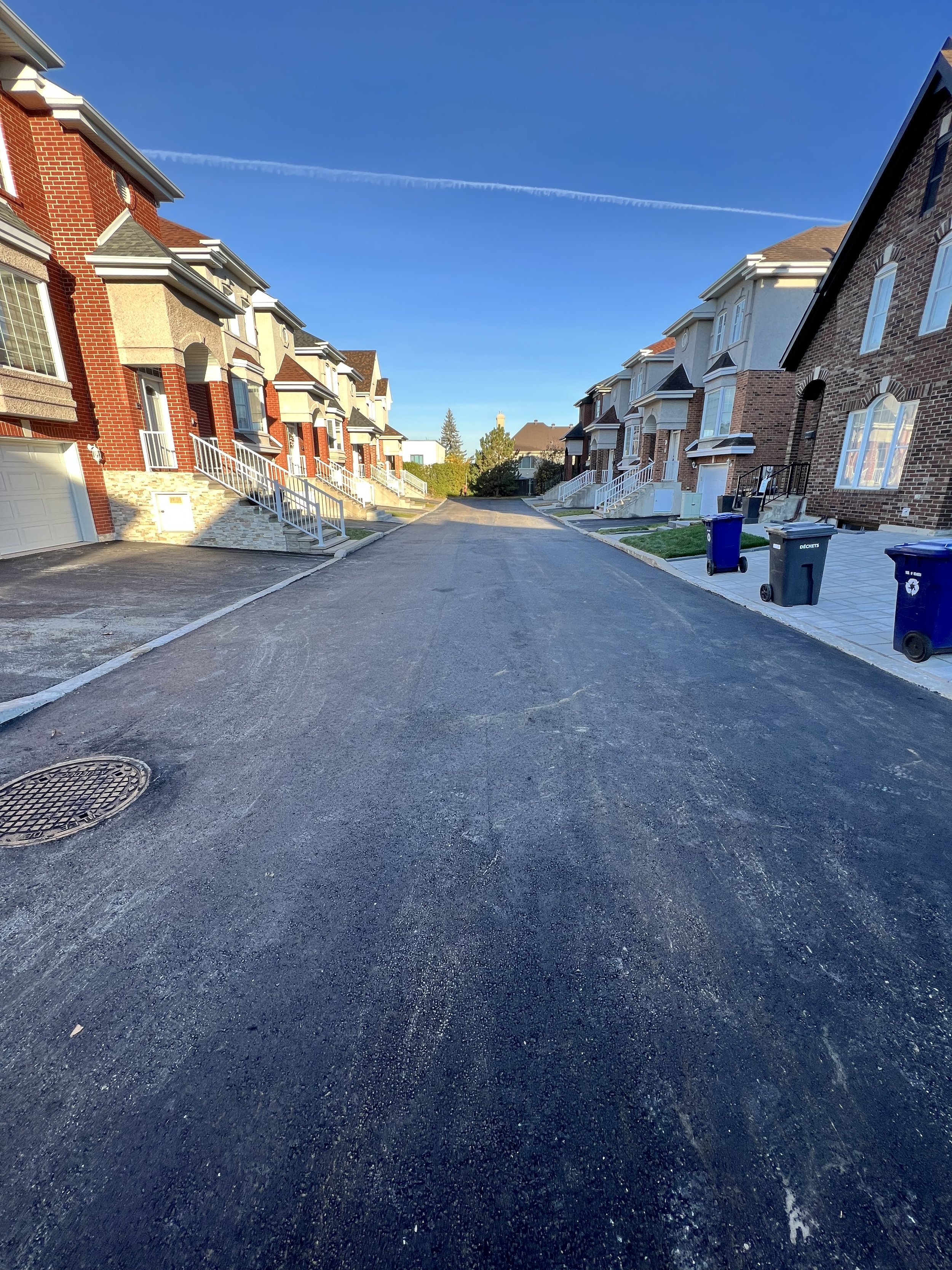 16_MAXCOR_Construction_Montreal_Laval_Regrade_Repave_Street_Driveways.jpeg