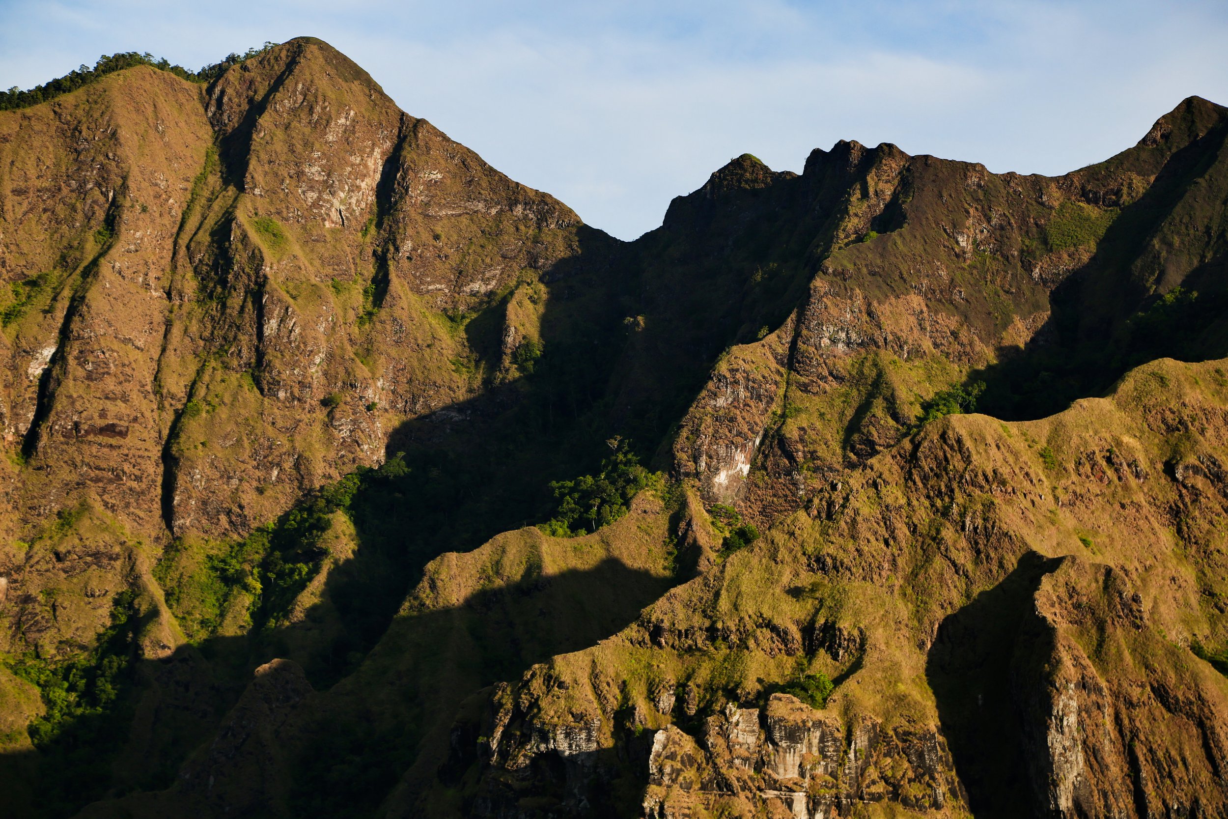 The mountains surrounding the tallest volcano on Flores Island, Mt. Inerie, a sacred place and being for those living in the shadow of the great peak.
