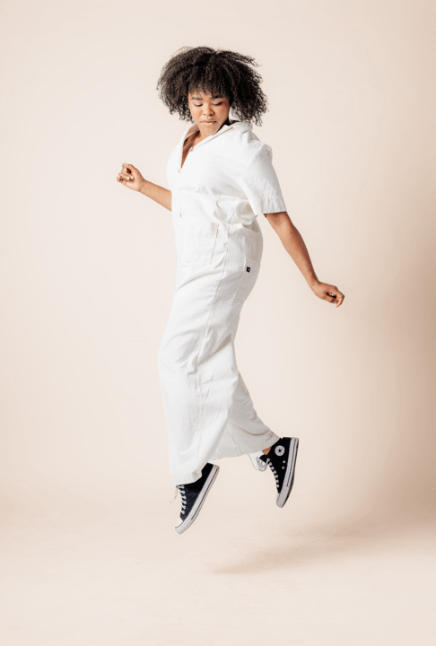 animated collage of a woman wearing a jumper jumping