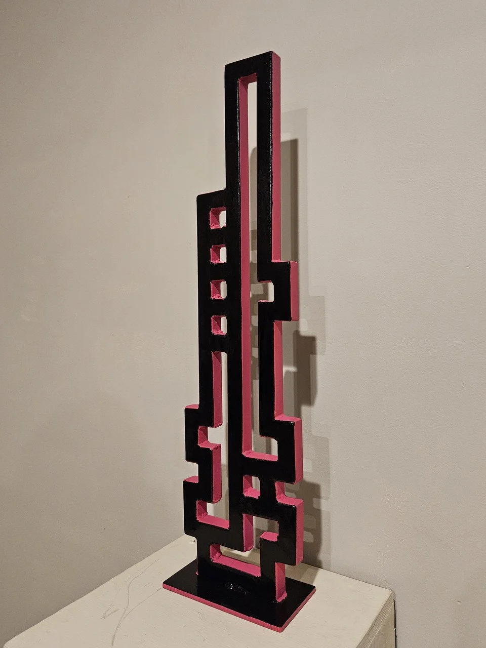 "Music" by Dakota Merritt; steel square tubing, oil enamel paint; 2024