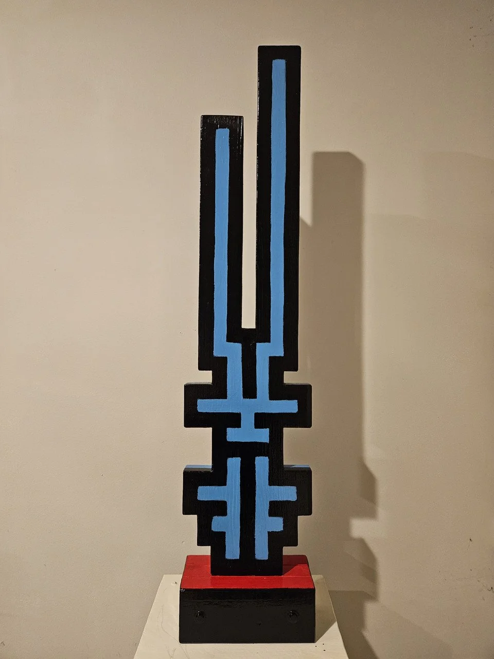 "Stag/Cherenkov" by Dakota Merritt; untreated yellow pine, oil enamel paint; 2024