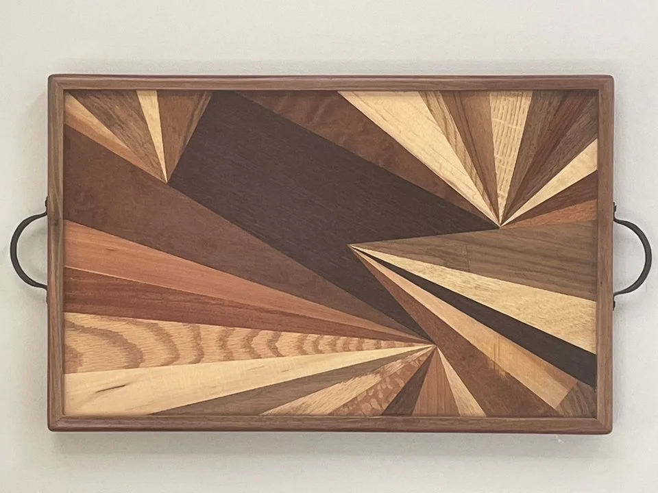 "Tray/Wall Art #1" by Cris Eklund; wood veneers, solid walnut frame; 2023