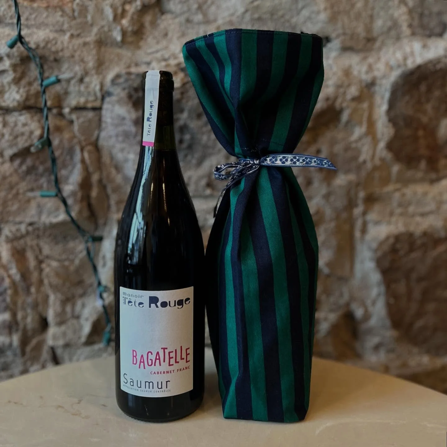 Best Gift? Wine! 
Grab a bottle + gift bag, and be on your merry way.