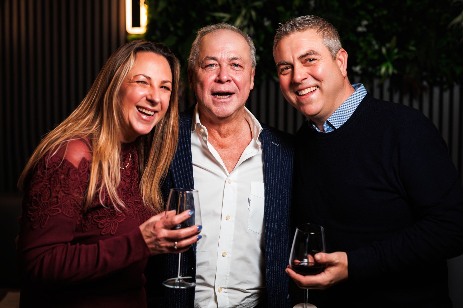 Smiling guests enjoying a bespoke private wine tasting experience with Colby Wines in Merseyside.