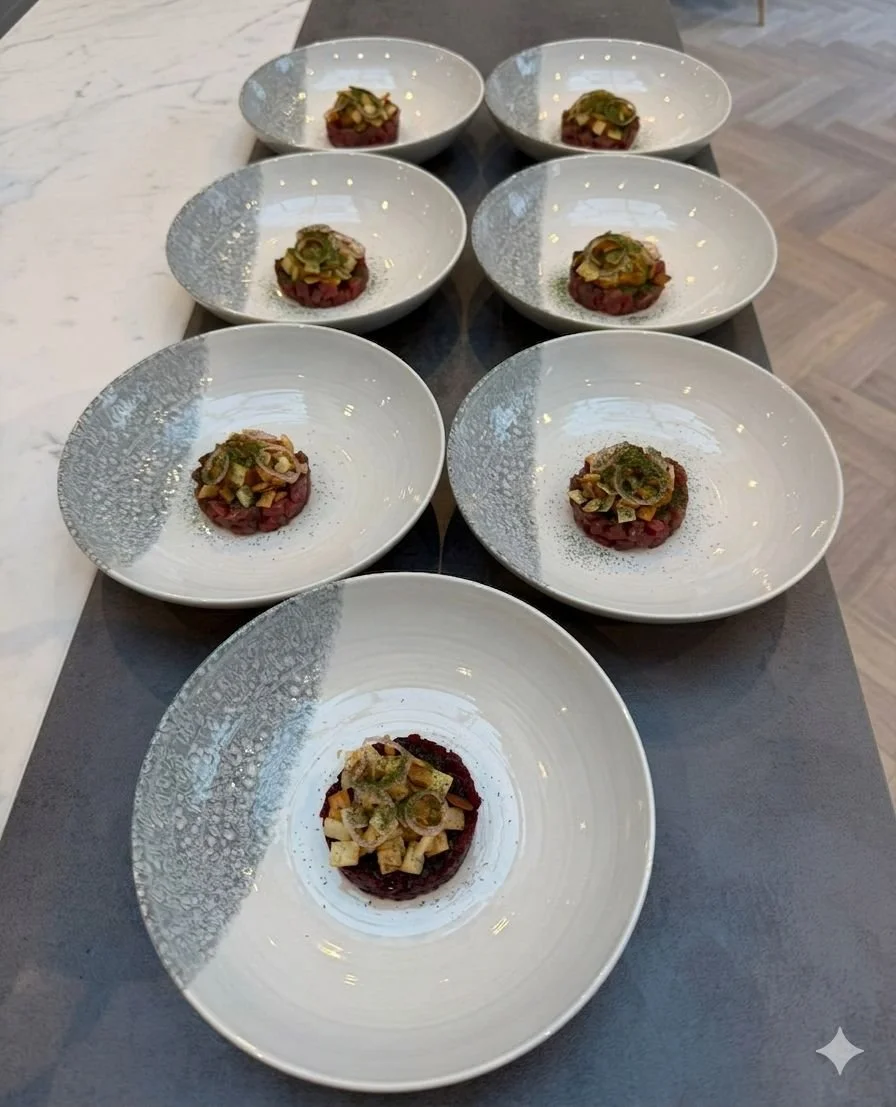 A line of beautifully plated beef tartare dishes prepared by a private chef for an exclusive multi-course wine pairing dinner experience in Chester.