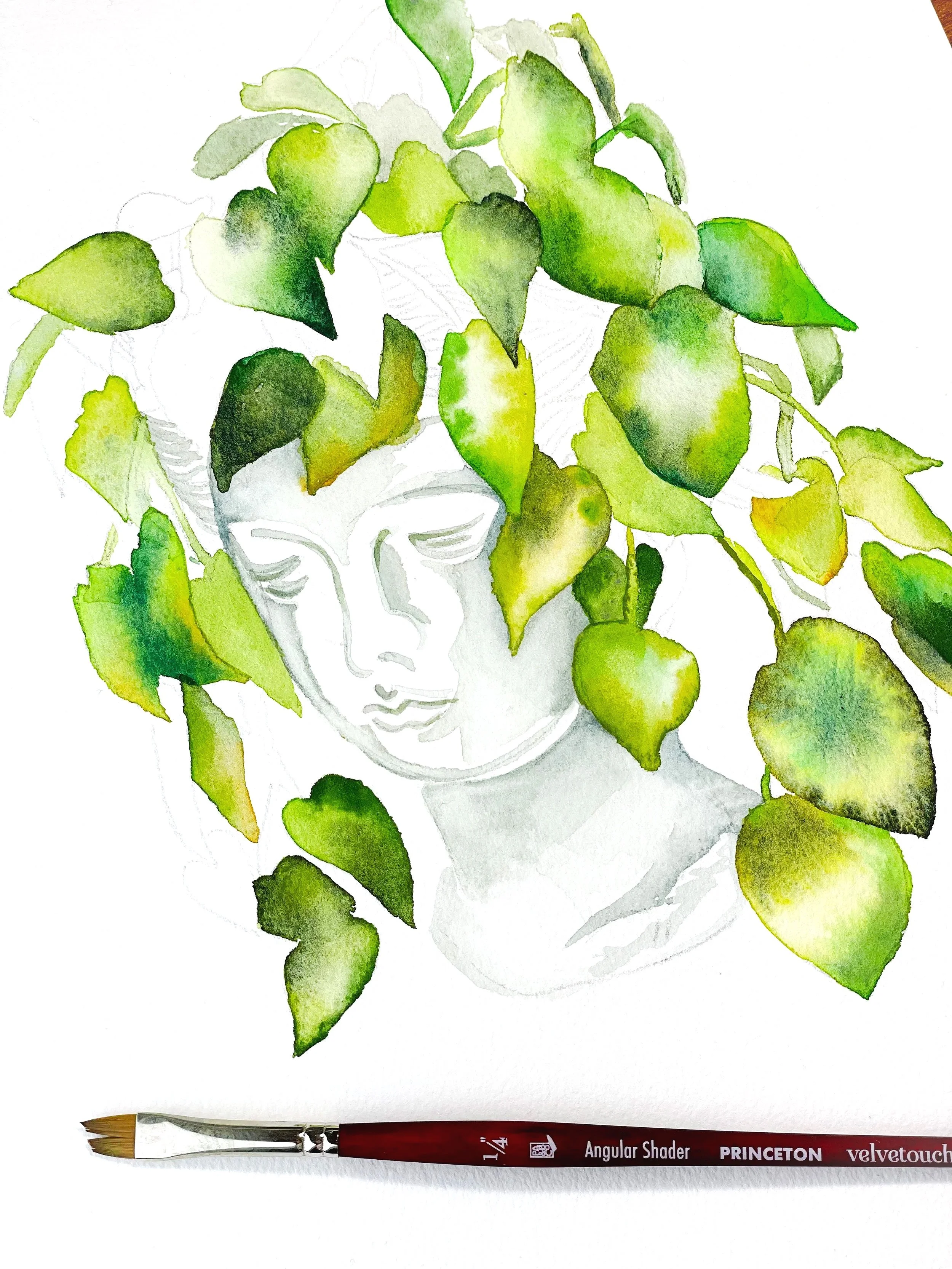 A watercolor painting of a woman's face with closed eyes, overlaid with green leaves forming her hair, and a paintbrush at the bottom.