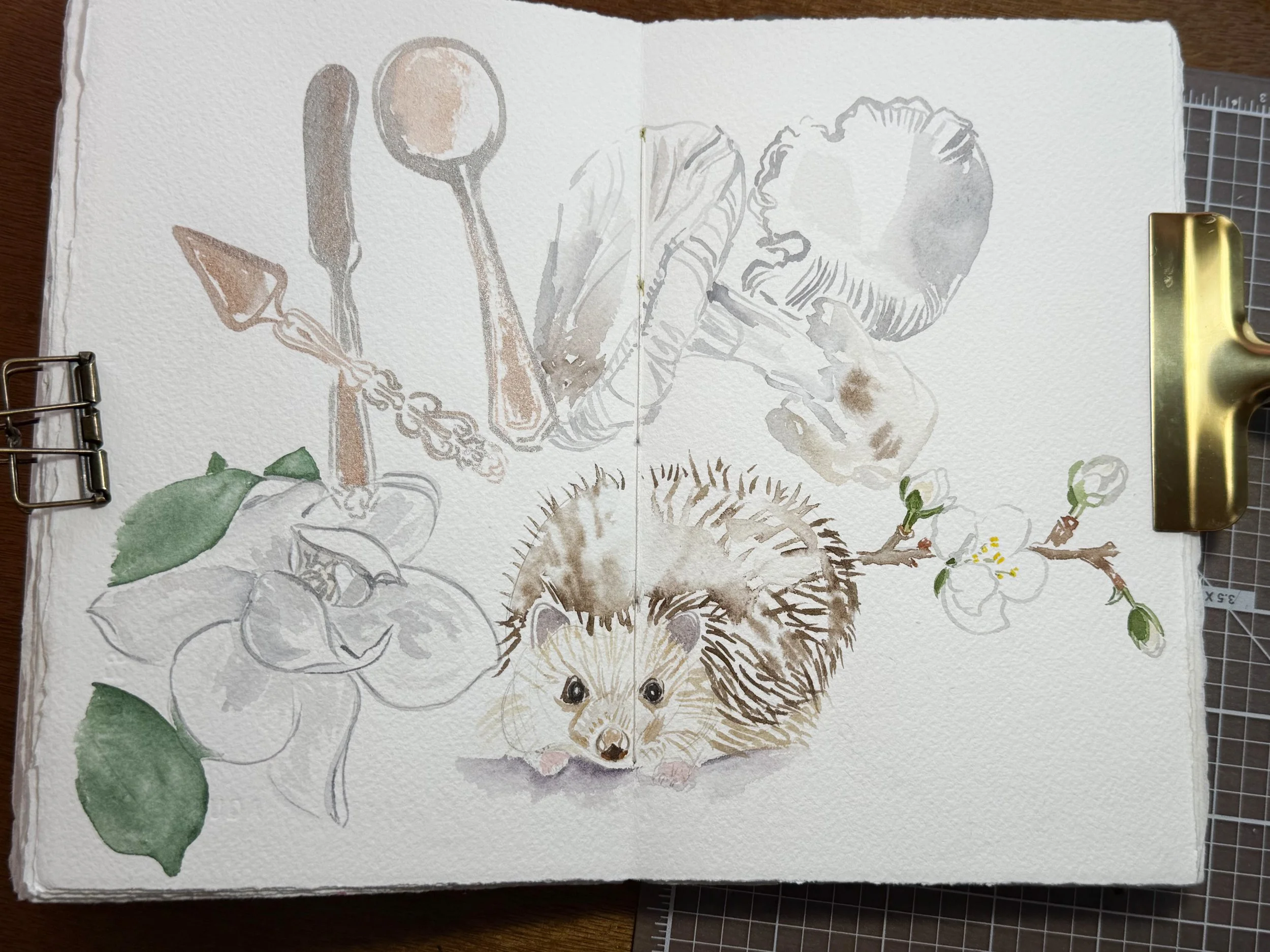 Watercolor illustration of a hedgehog, plum blossoms, a mushroom, a hand holding a spoon, and garden tools on textured paper.