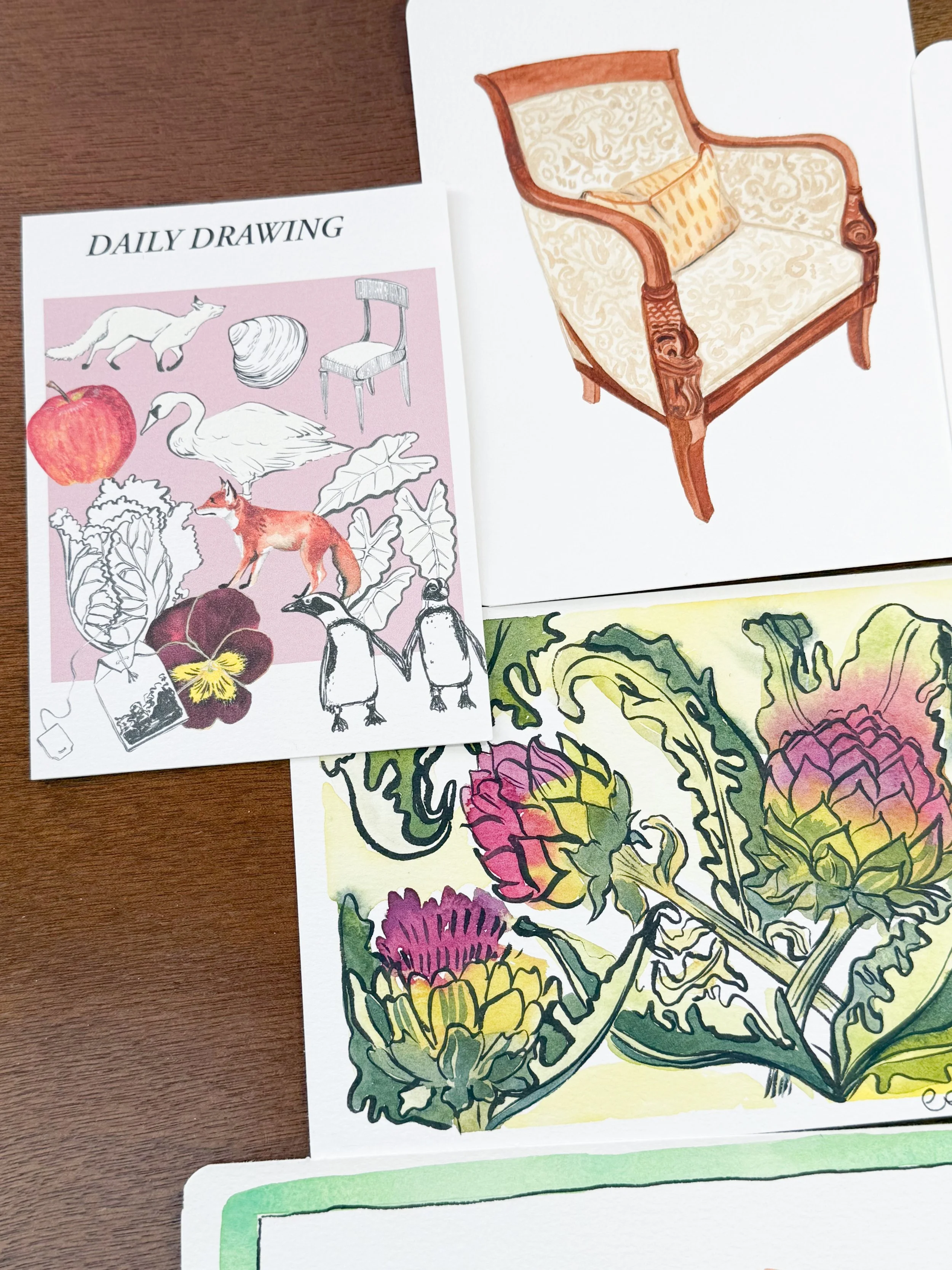 A paper with a colored drawing of arts and crafts, featuring artichokes and other plant details, and a sheet with sketches and watercolor of various animals, plants, and a chair labeled "Daily Drawing".