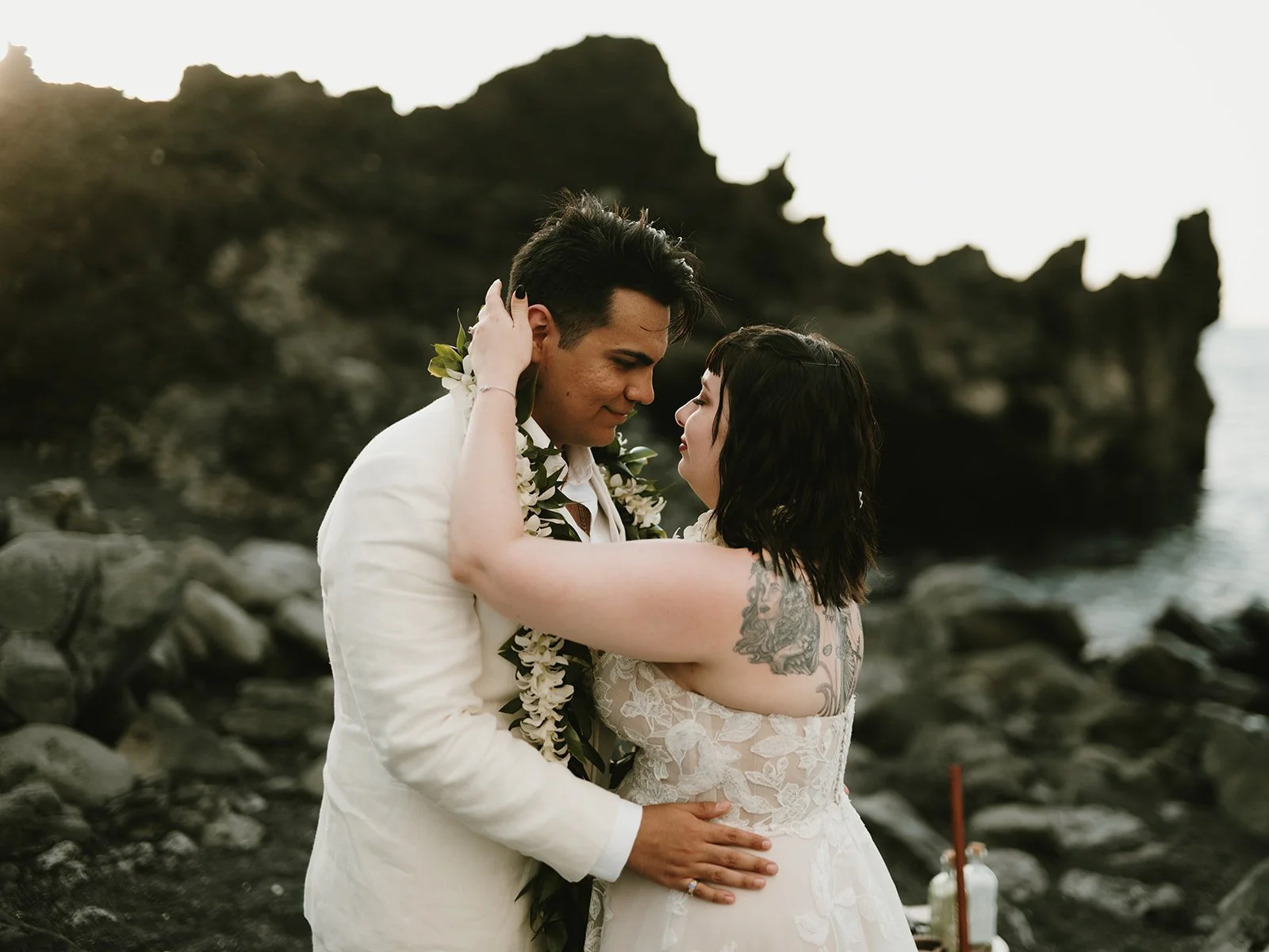 Private Kona elopement ceremony on volcanic black sand
