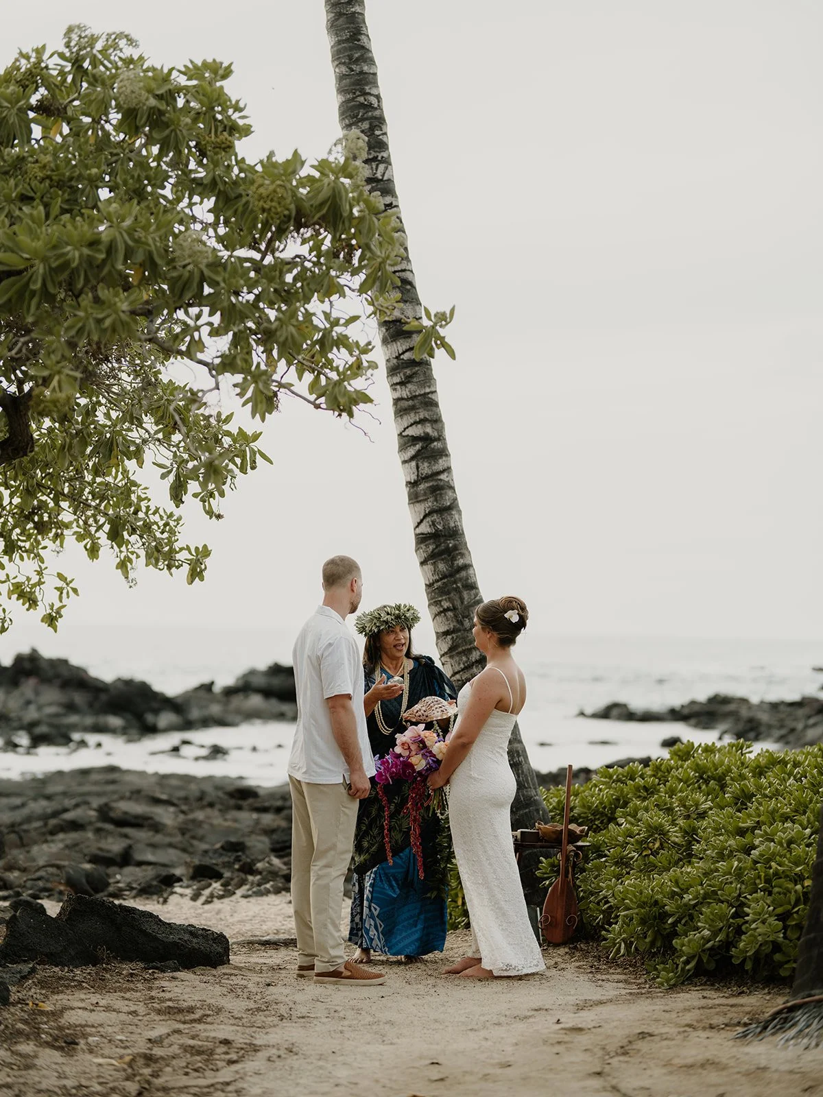 Intimate Big Island elopement ceremony at sunset featuring Casey and Jacob
