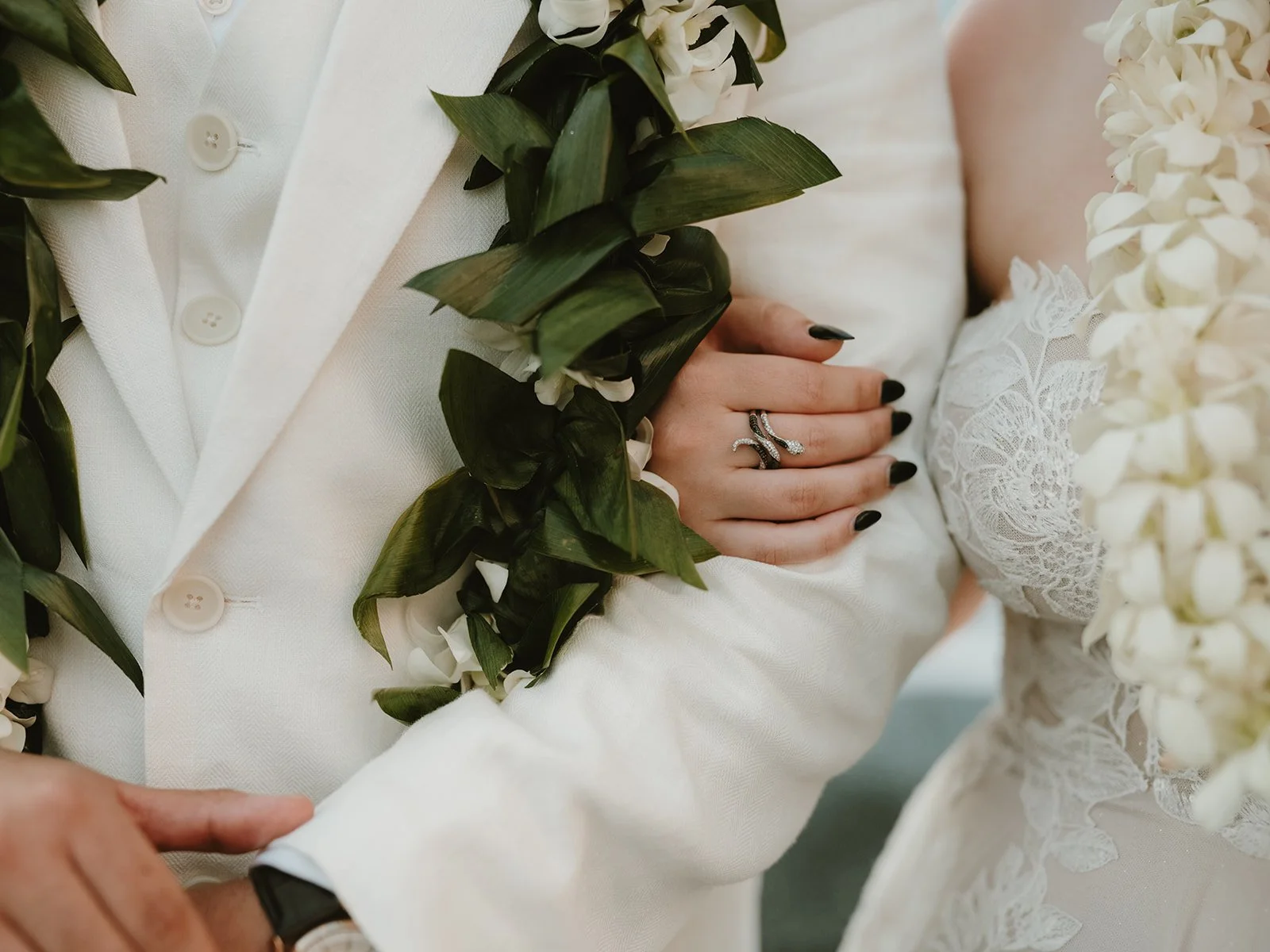 Secluded Kona black sand beach elopement captured by Couple Cups