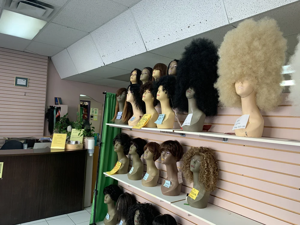  Wigs on-shelf display at Ragga Hair Studio &amp; Beauty Supply Store on Friday, March 19, 2021. (DeAndra Asapokhai/ RSJ) 