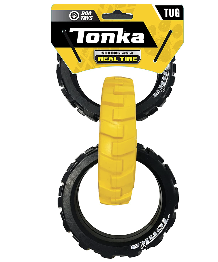Two black toy dog tug rings with yellow handles, packaged in a yellow and black cardboard backing labeled 'Tonka' and 'Dog Toys.'