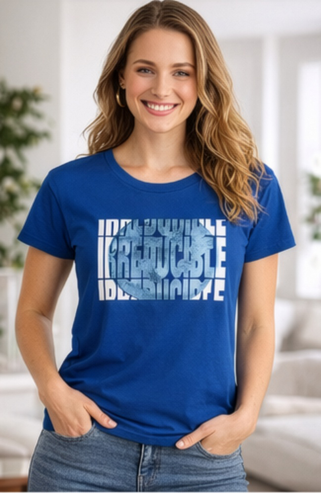 Female model wearing royal blue t-shirt of fragmented block typography for a bold, architectural look