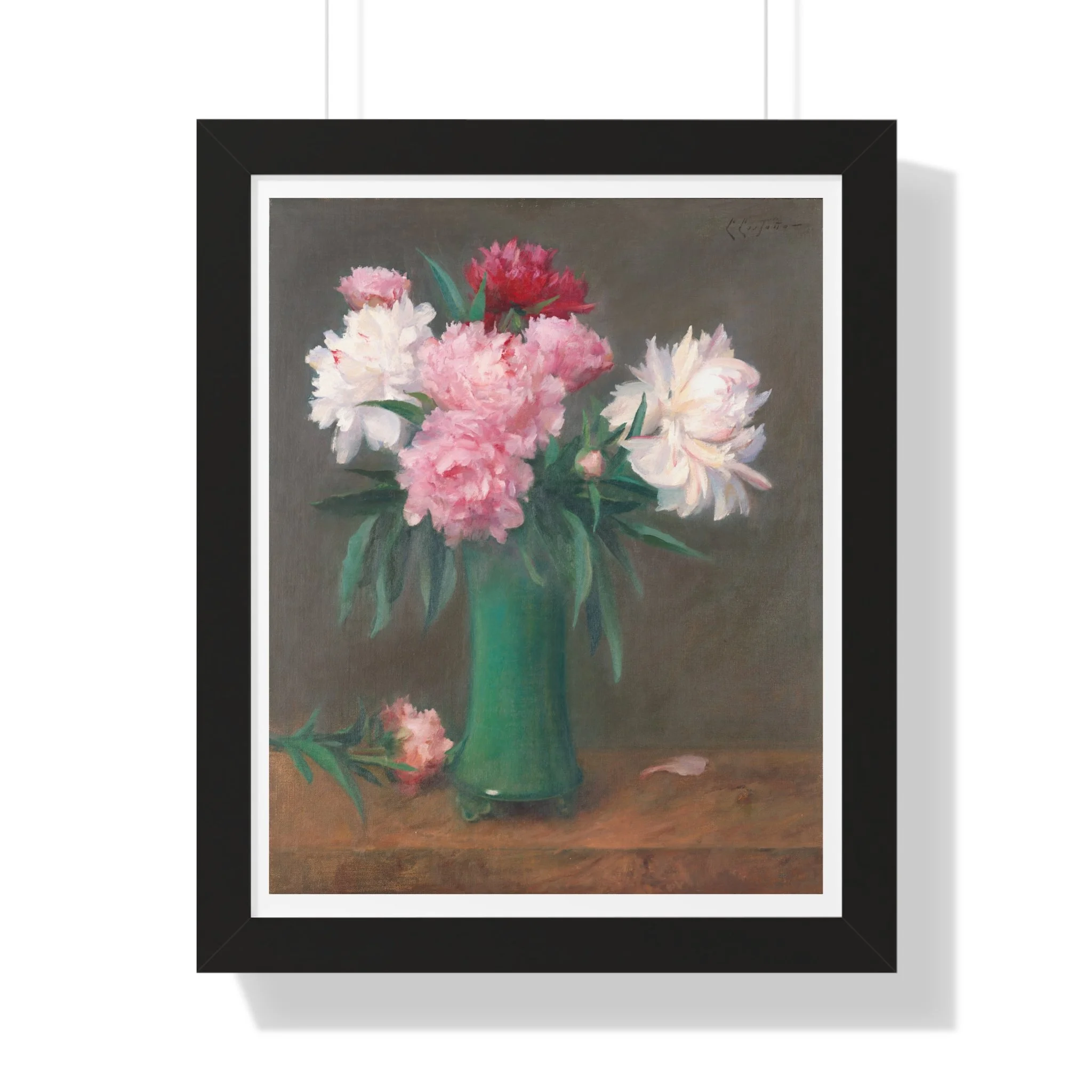 Fine art print of pink and white peonies in a green vase with soft lighting and muted background in walnut frame