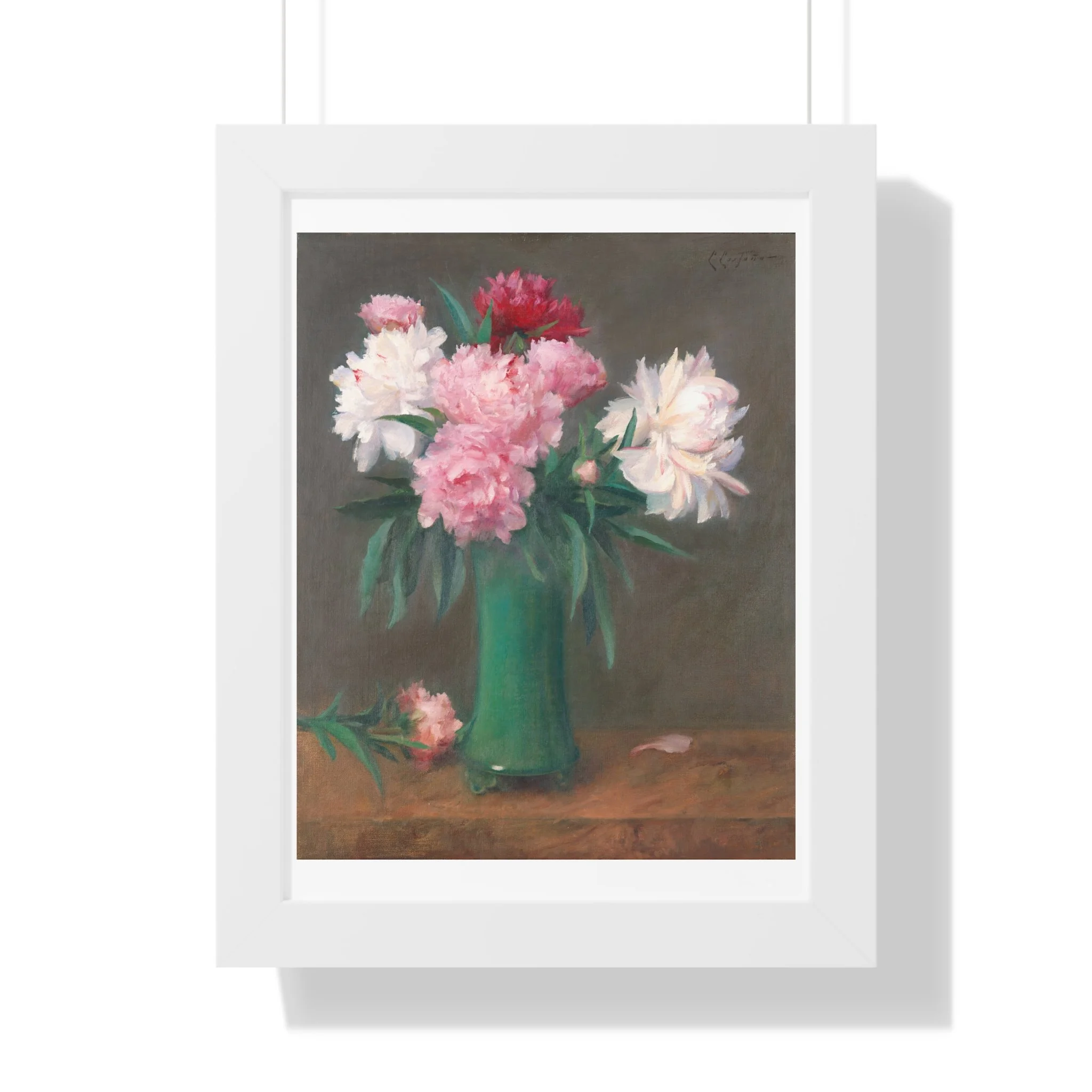 Fine art print of pink and white peonies in a green vase with soft lighting and muted background in white frame