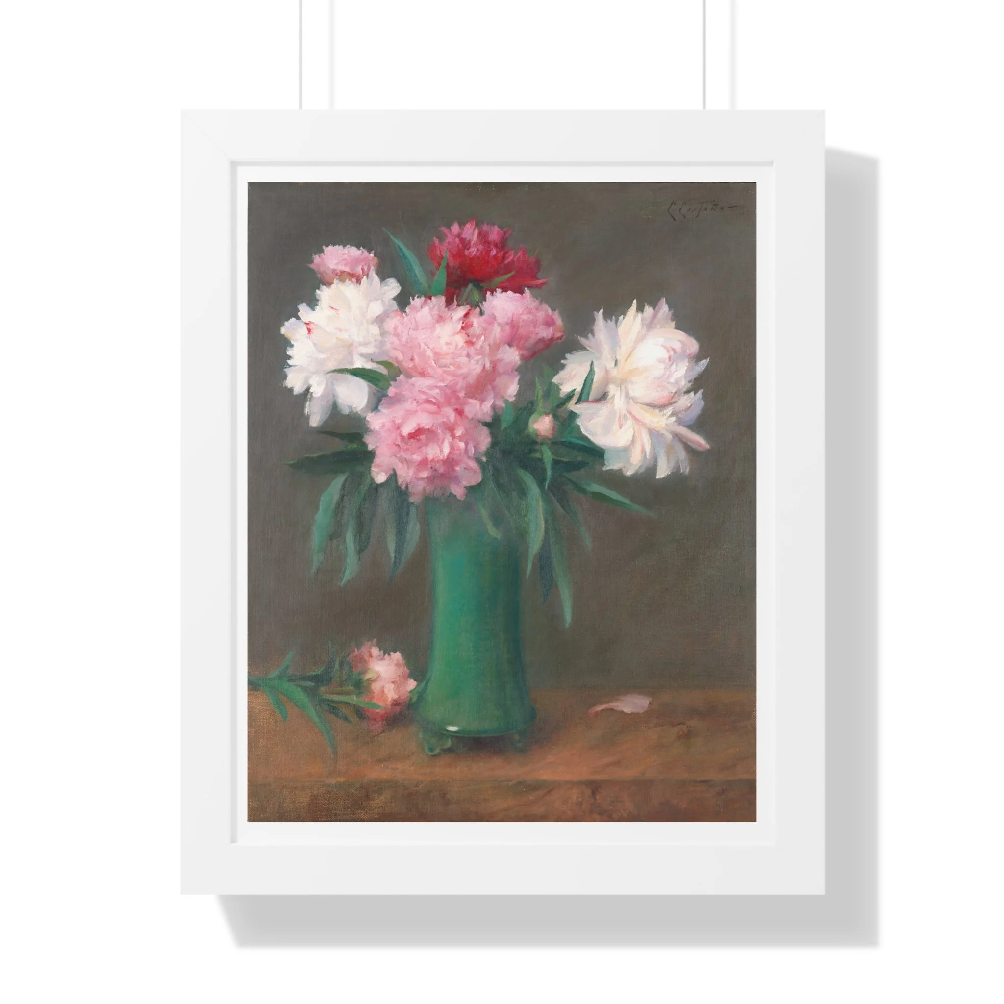 Fine art print of pink and white peonies in a green vase with soft lighting and muted background in white frame