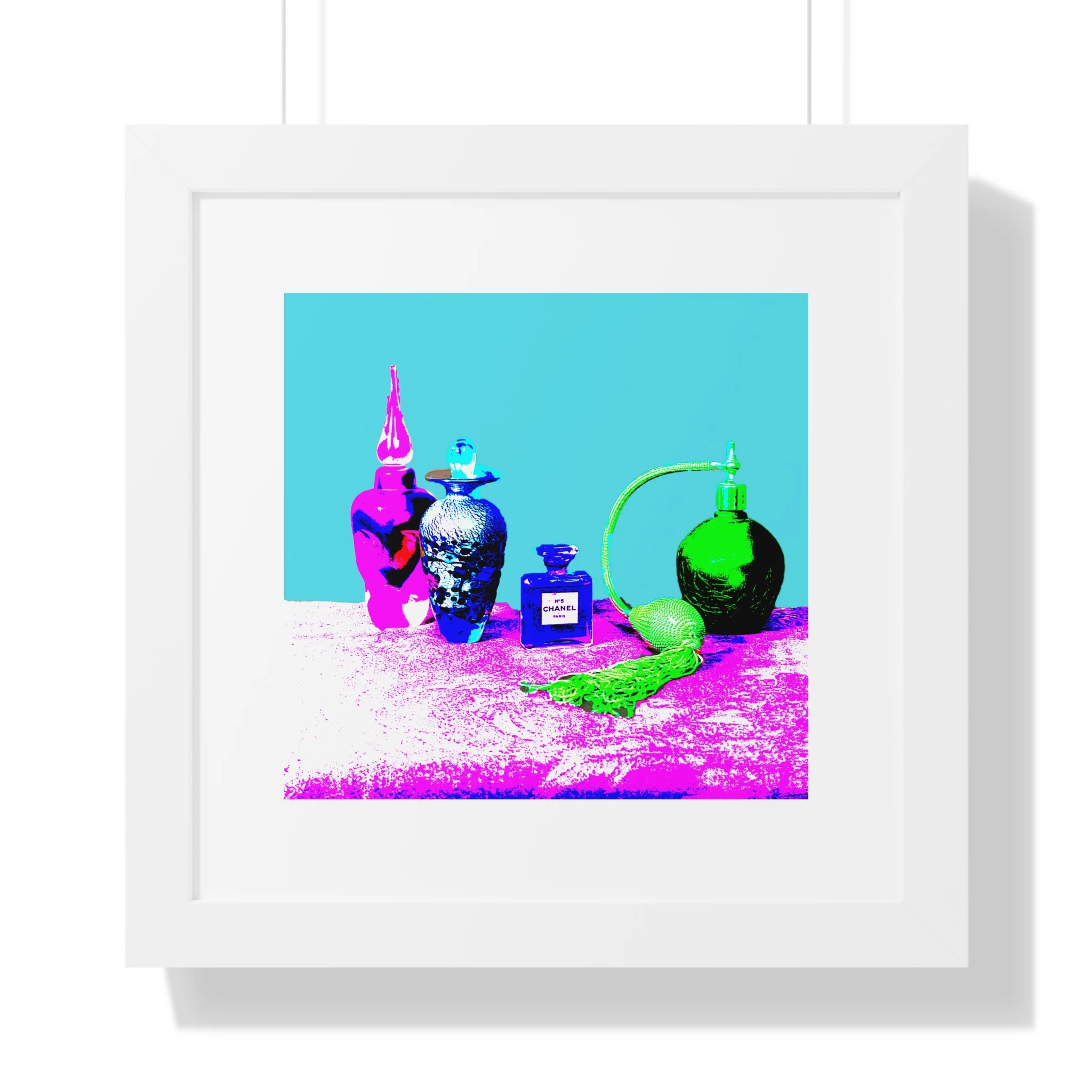 Chanel inspired perfume bottles in bright color in white frame