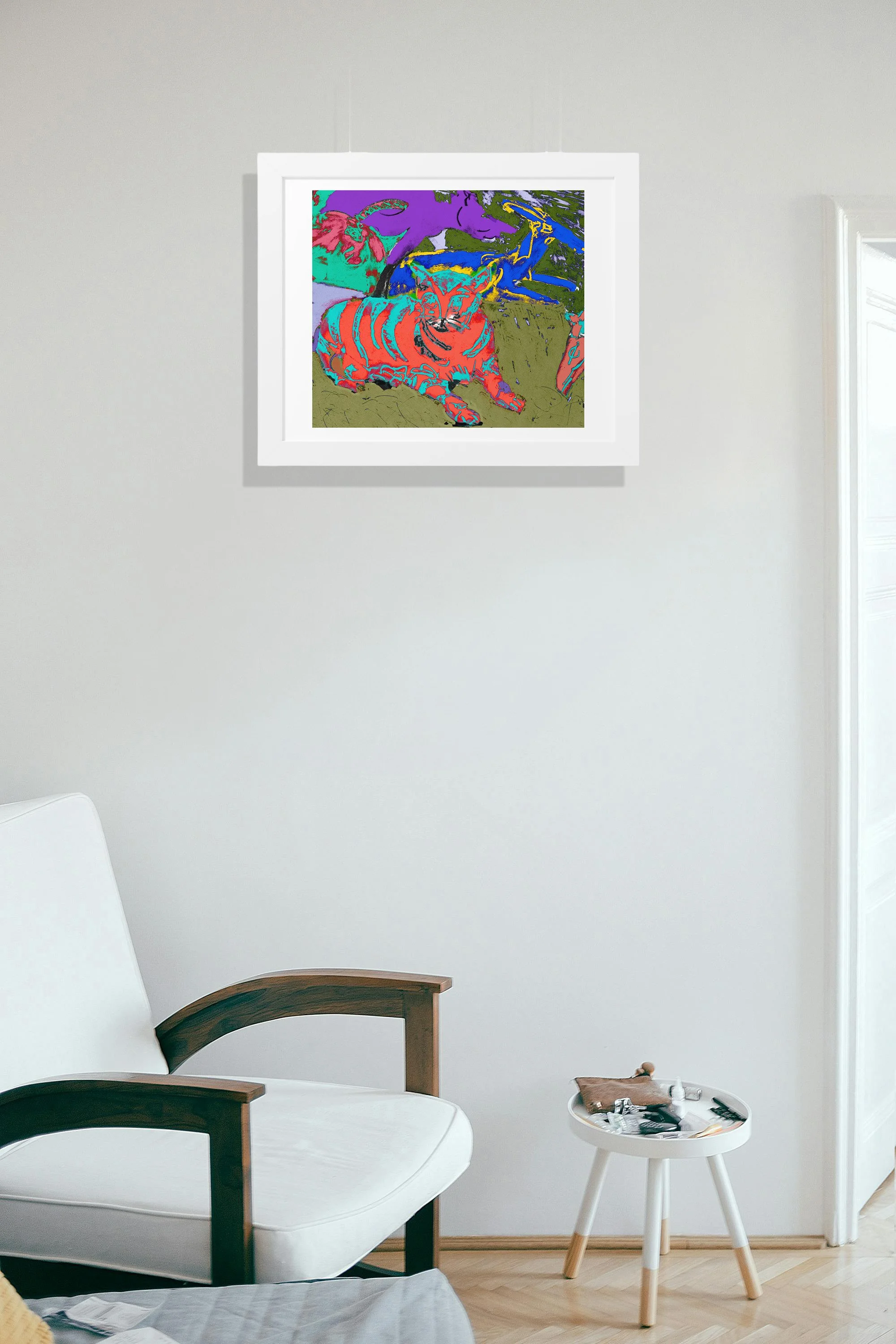 Colorful cat art print framed in white with a matte.  hang above a stylish white based sofa and small side table