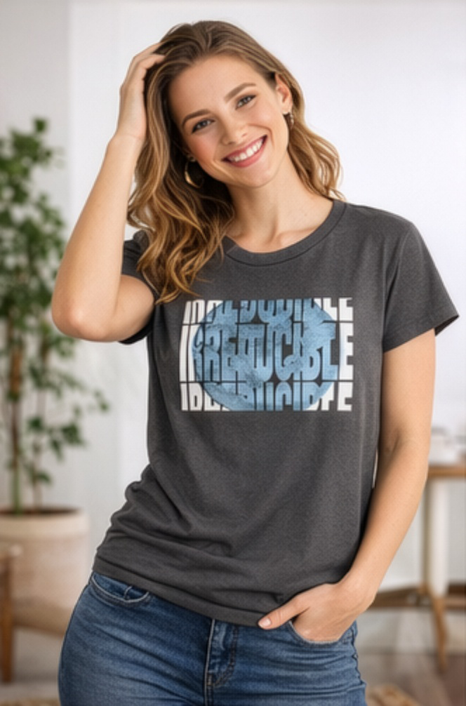 Female model wearing charcoal t-shirt of fragmented block typography for a bold, architectural look