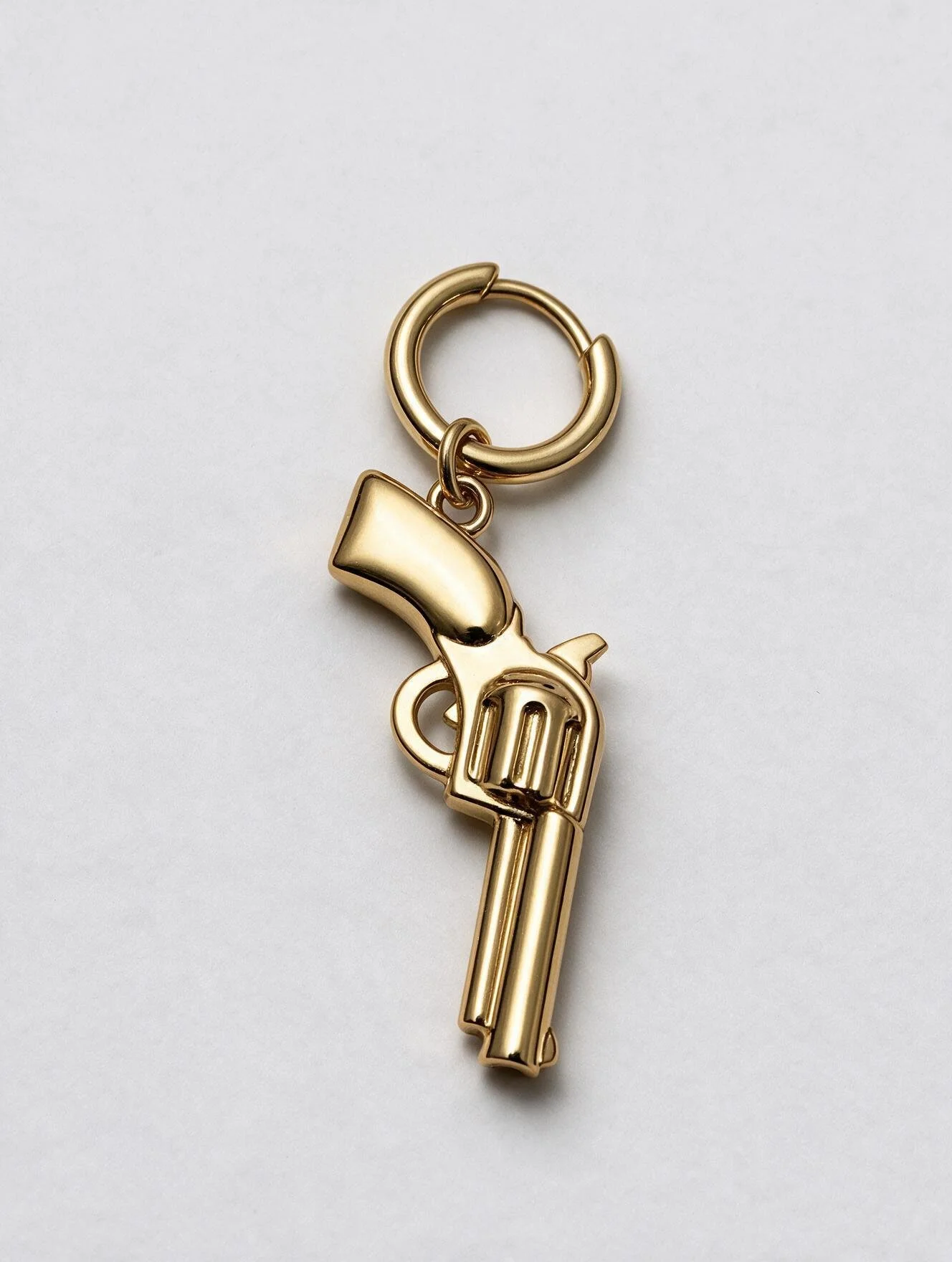 PIERCING PISTOLA oro