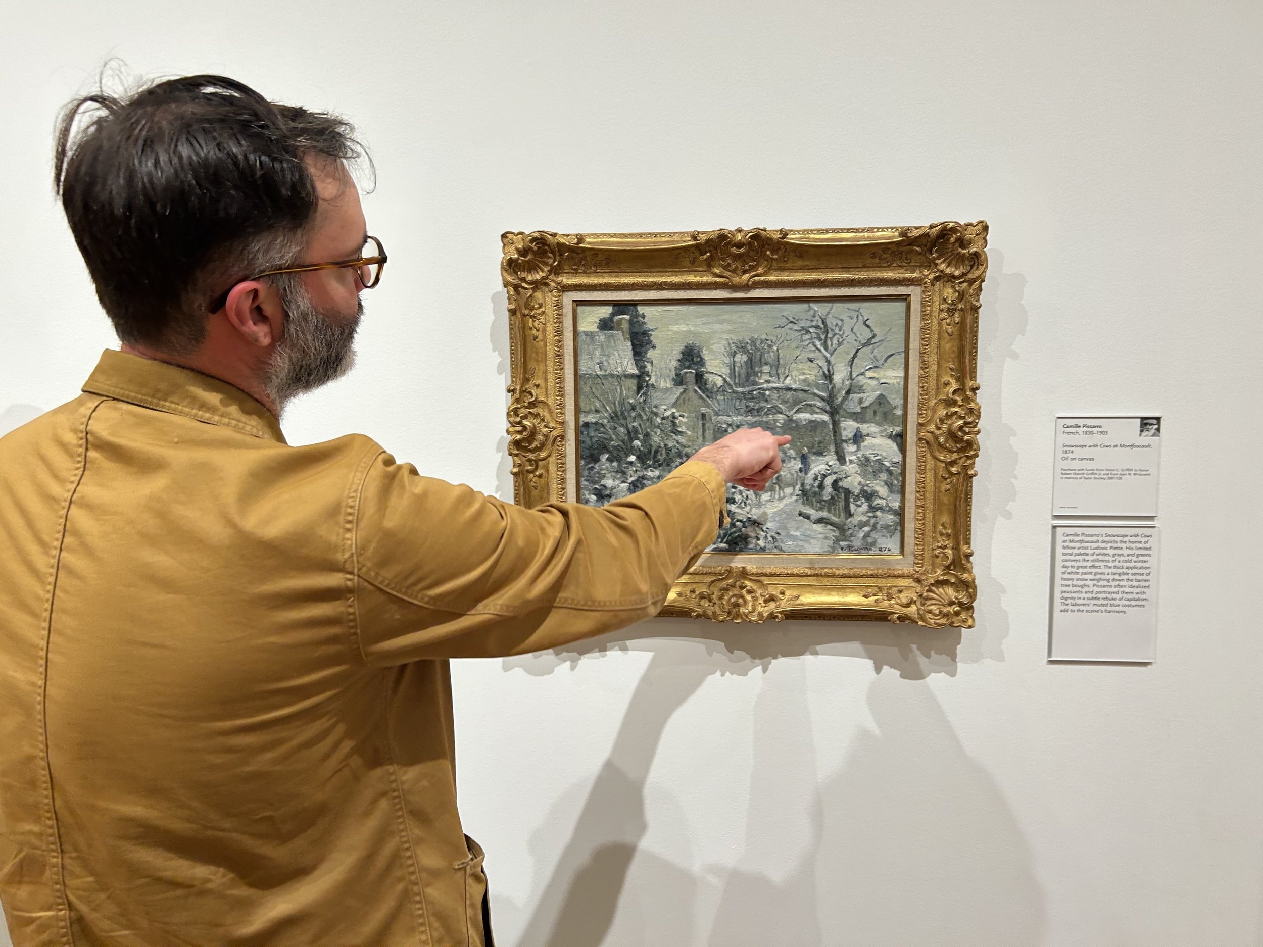 Jordan at the High Museum interacting with a Pissarro