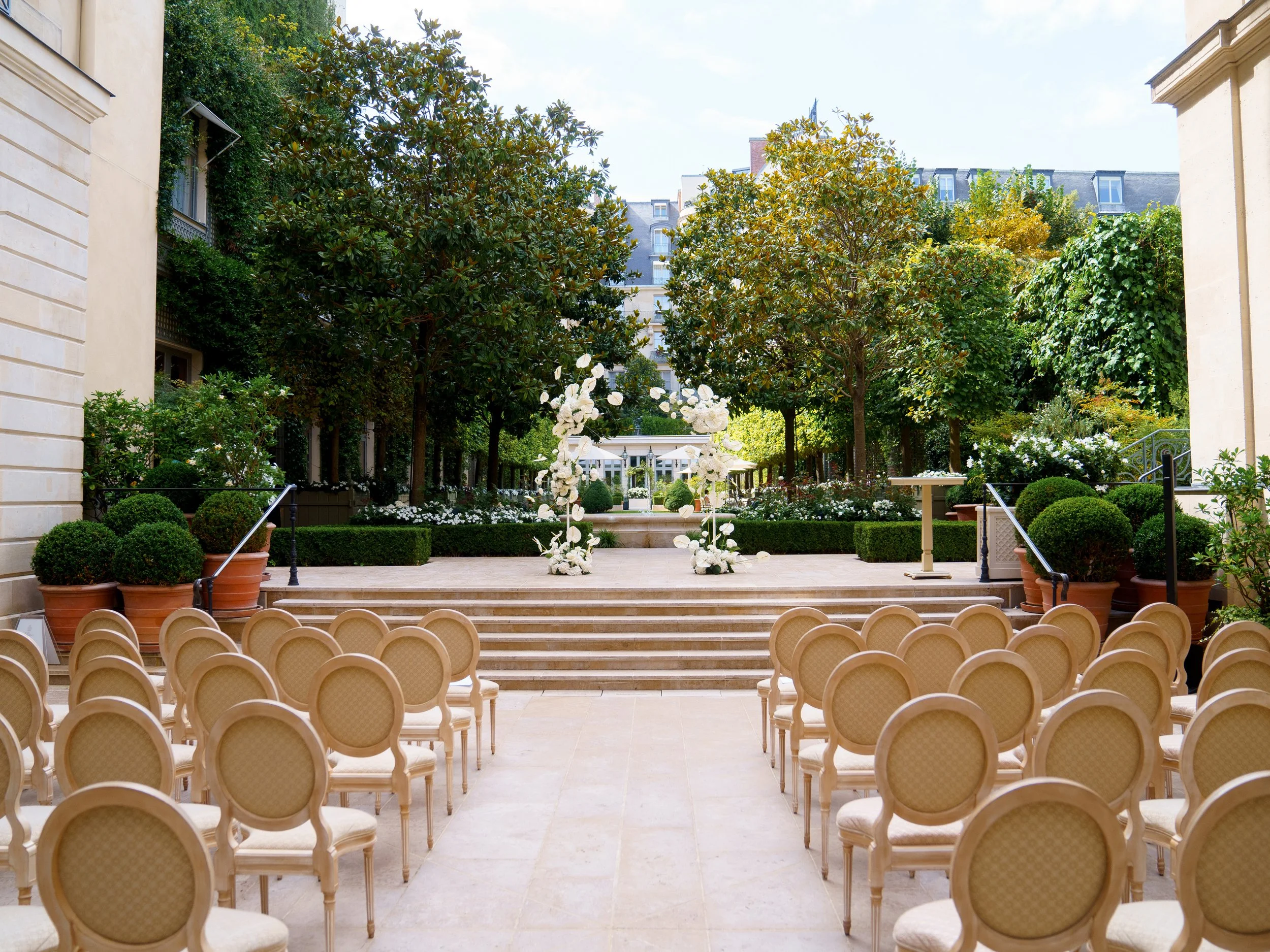 luxury-destination-wedding-ritz-paris-white-floral-arch.jpg