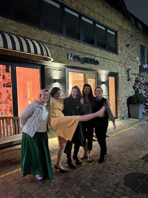 Group photo outside The Notting Hill Club after an evening of networking