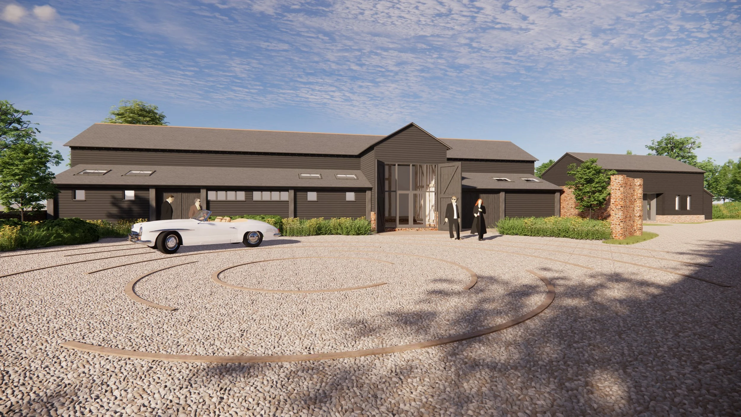Entrance court and weatherboarded venue barn with glazed cart doors at Braham Hall Barns, Suffolk