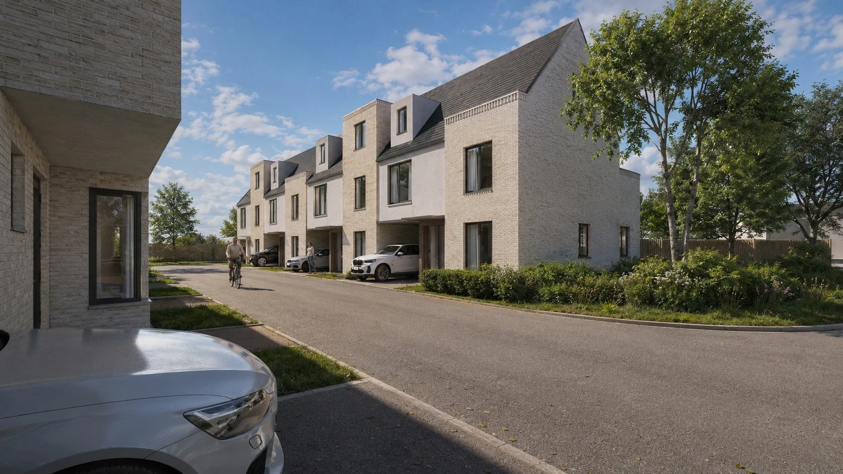 Writtle Road, Chelmsford: a terrace of three-storey brick and render houses with car ports and dormers