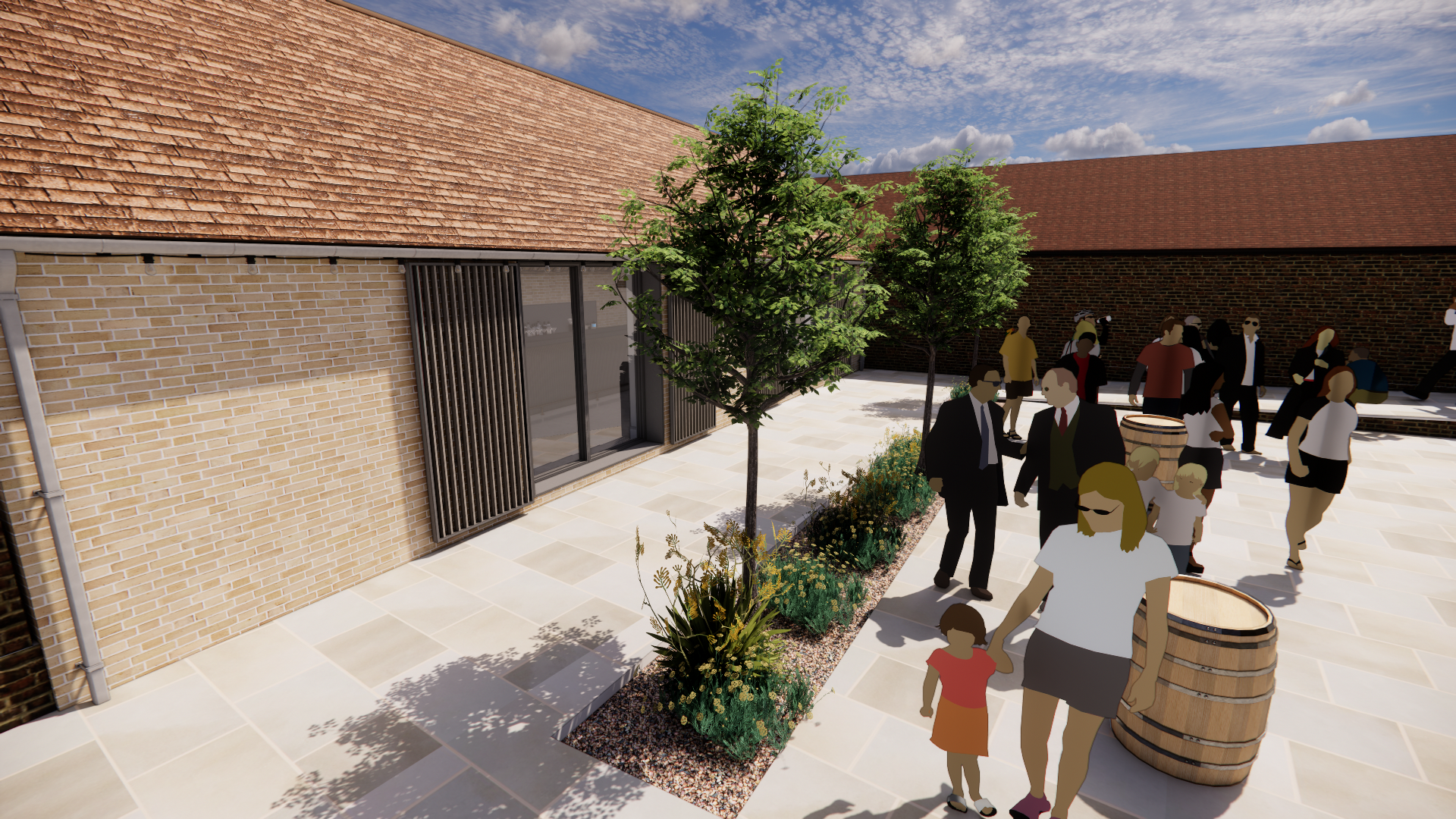 Guests in the planted courtyard beside the glazed bar barn at Braham Hall Barns, Suffolk